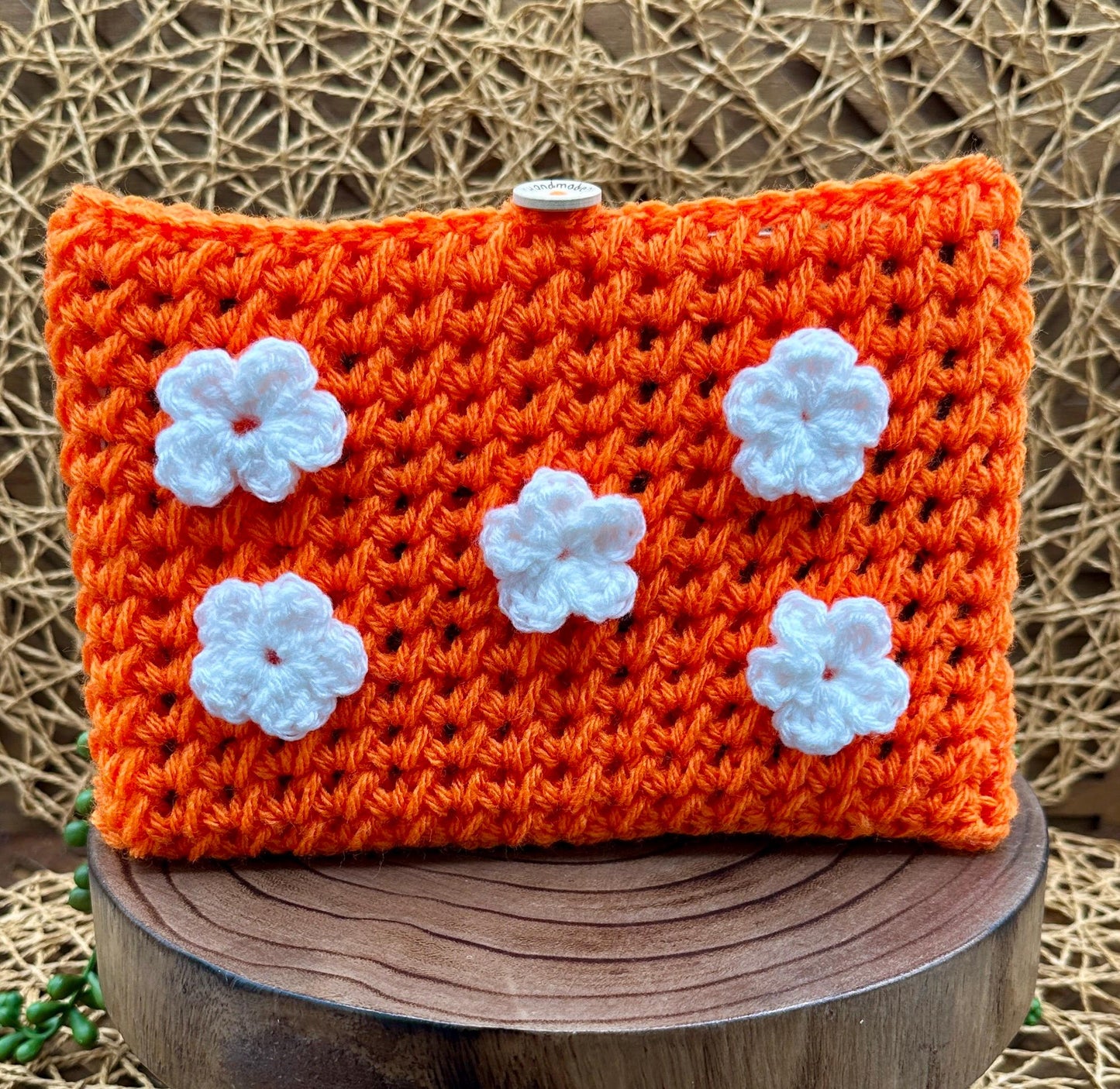 Flower Power Book Sleeve, Soft Crochet in Orange Yarn with White Flowers, Secure Wood Button Closure Measures about 8.5 X6.5"