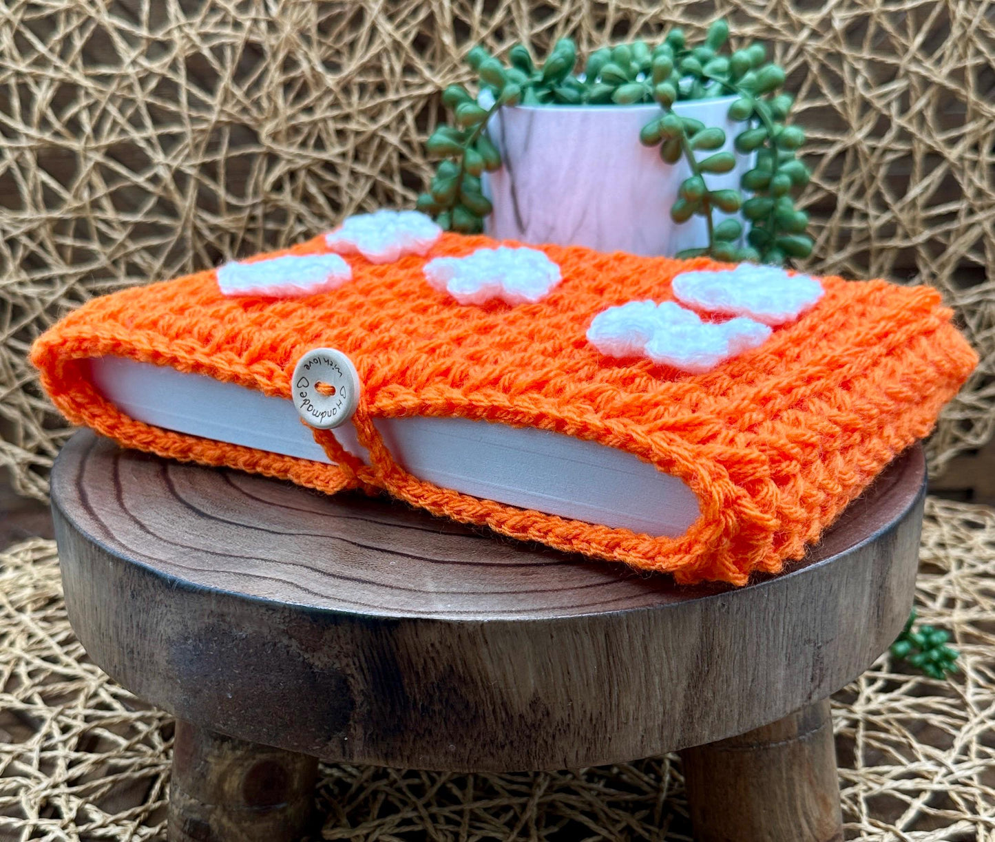 Flower Power Book Sleeve, Soft Crochet in Orange Yarn with White Flowers, Secure Wood Button Closure Measures about 8.5 X6.5"