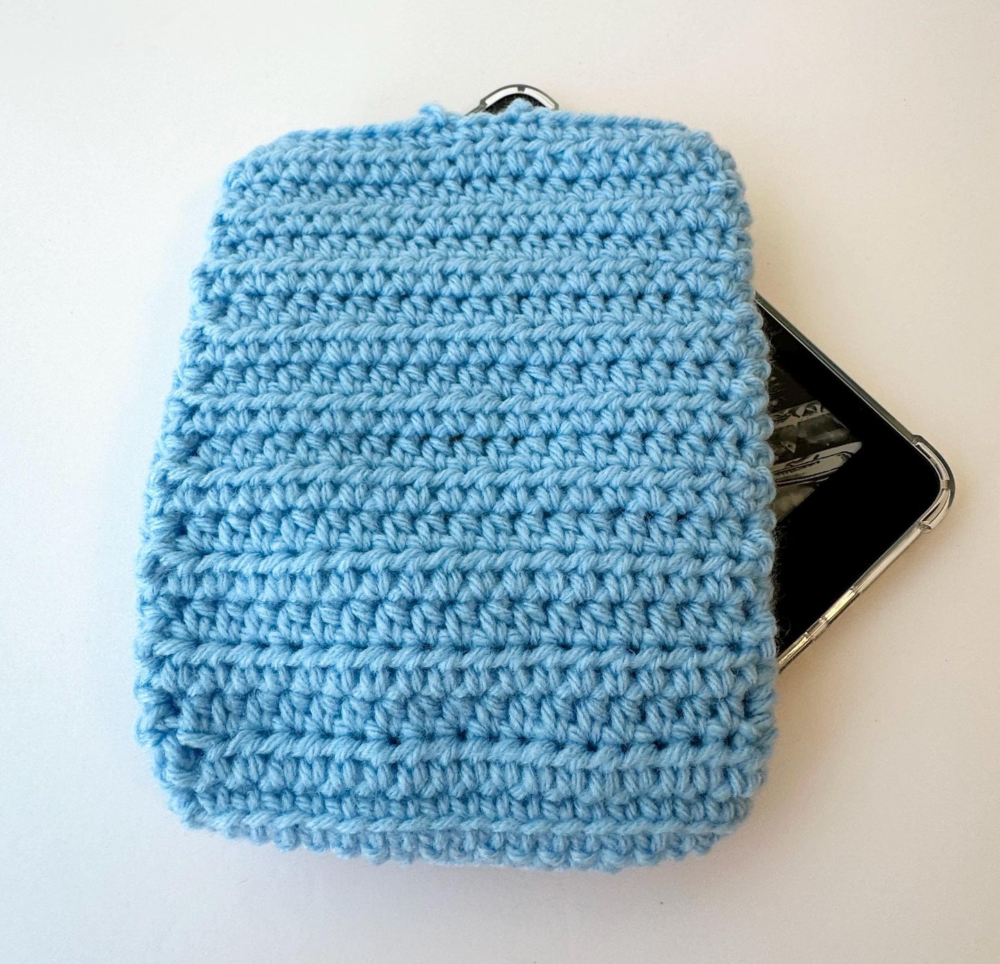 Blue Crocheted Kindle Sleeve with White Flower Granny Square & Wood Button, Handmade E-Reader Cover, Gift for Book Lovers measures 7.5 X 5.5
