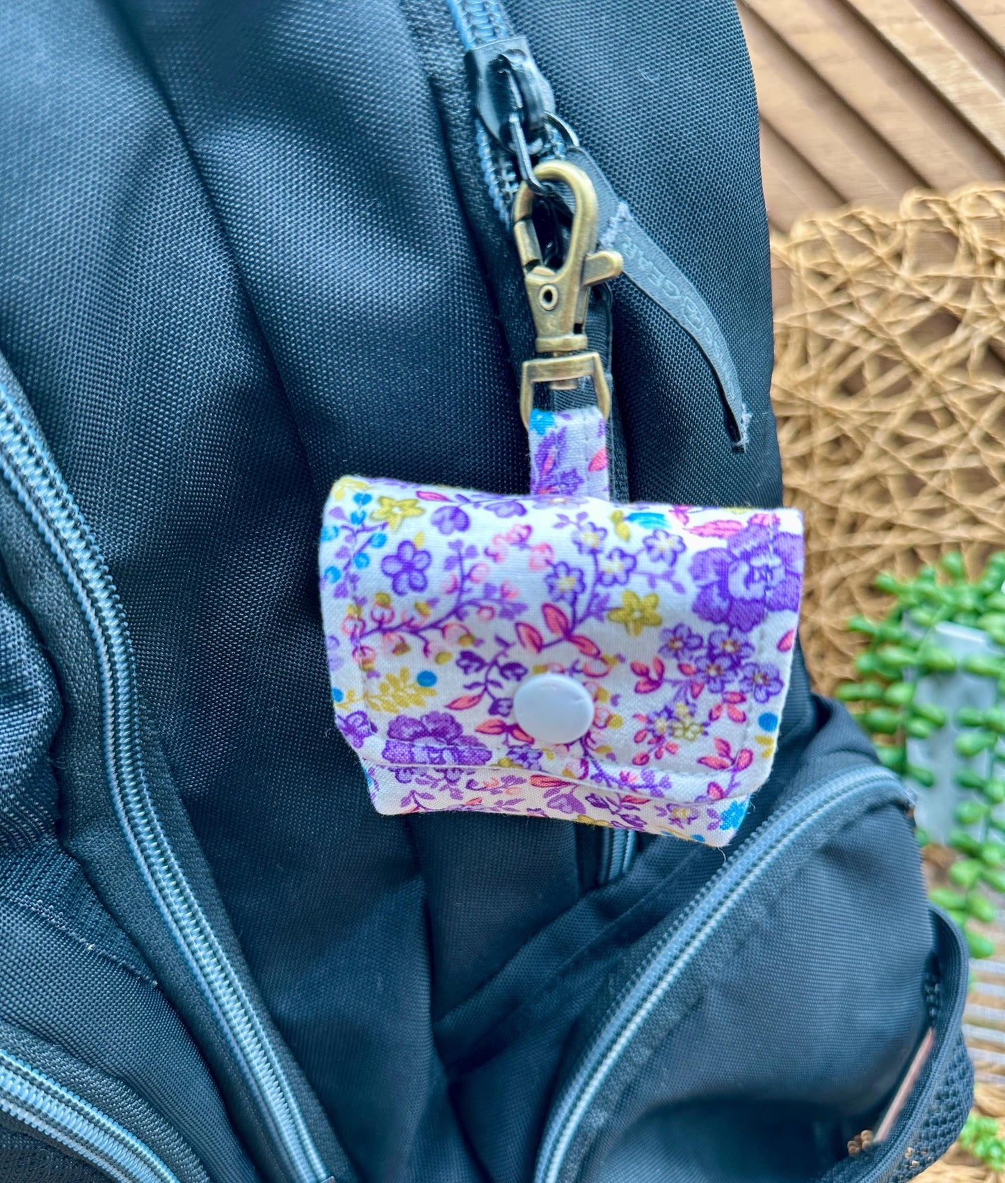 Wireless earbud case, Cute Purple and Yellow floral fabric with snap closure and swivel clasp for added protection and convenience, 3X3X.75"