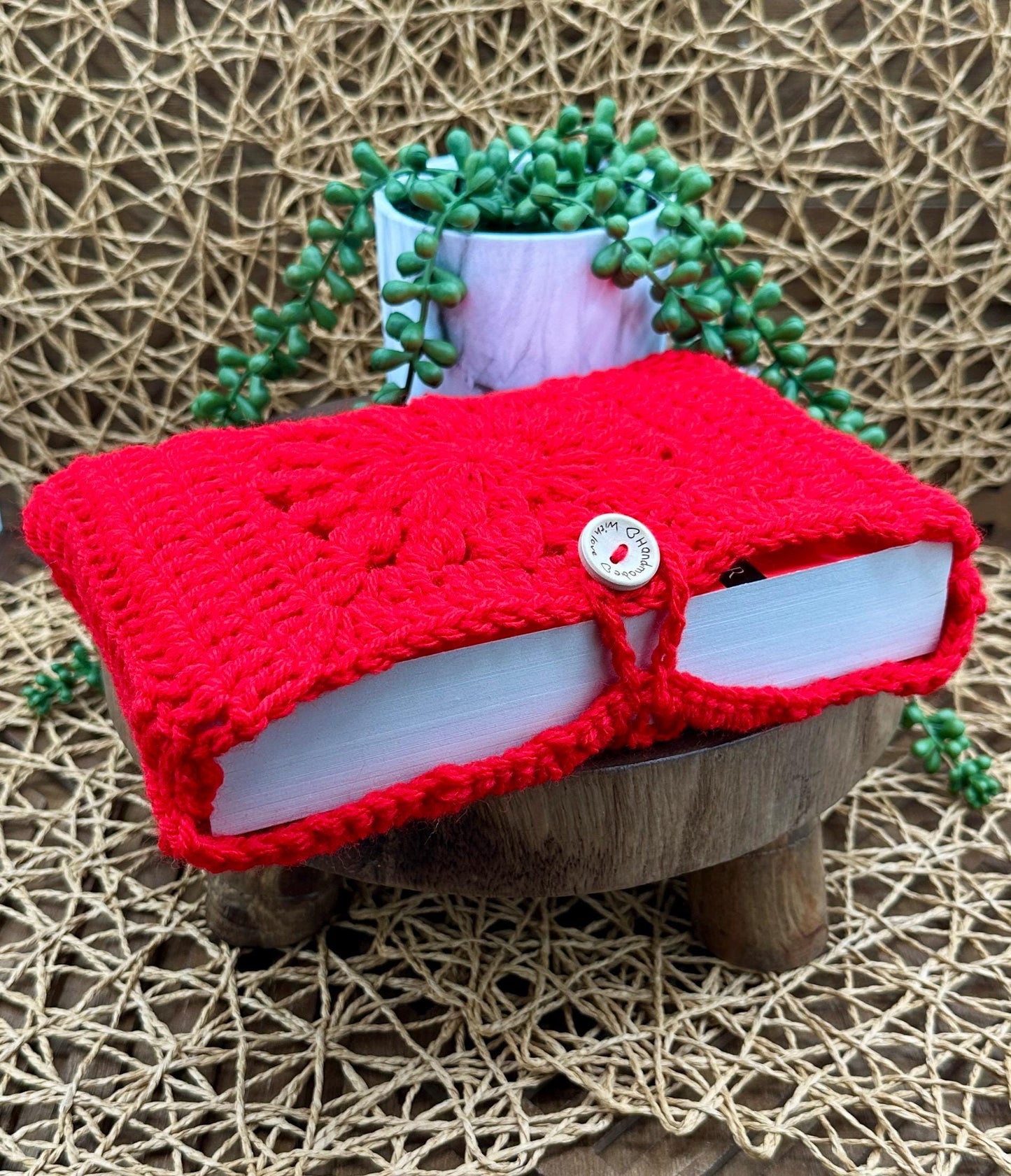 Book Sleeve Soft Crochet in Red Yarn Featuring a Classic Floral Granny Square Design Secure Wood Button Closure, Measures about 9X6"