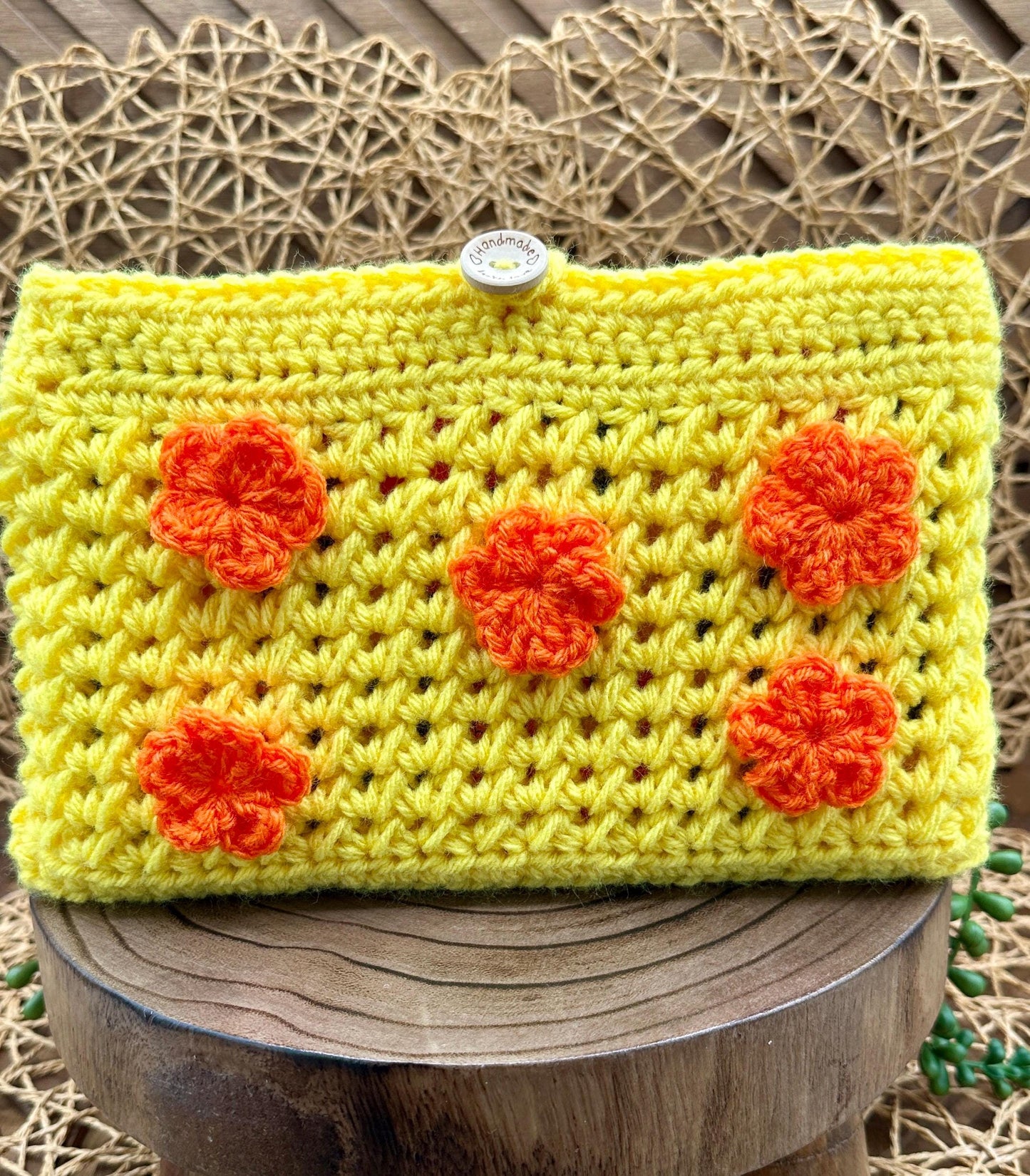 Flower Power Book Sleeve, Soft Crochet in Yellow Yarn with Orange Flowers, Secure Wood Button Closure Measures about 10 X6 "
