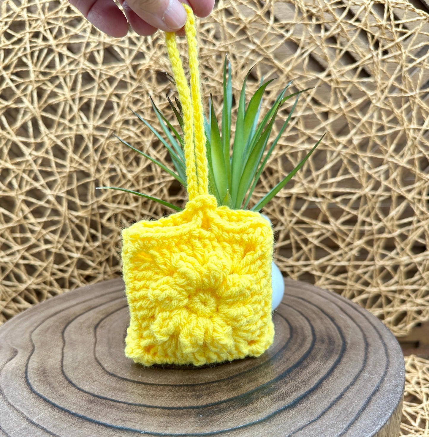 Yellow Crocheted Wireless earbud case, compatible with AirPods, measures 3 T 3 H .25 D, Pretty Raised Flower Granny Square Design