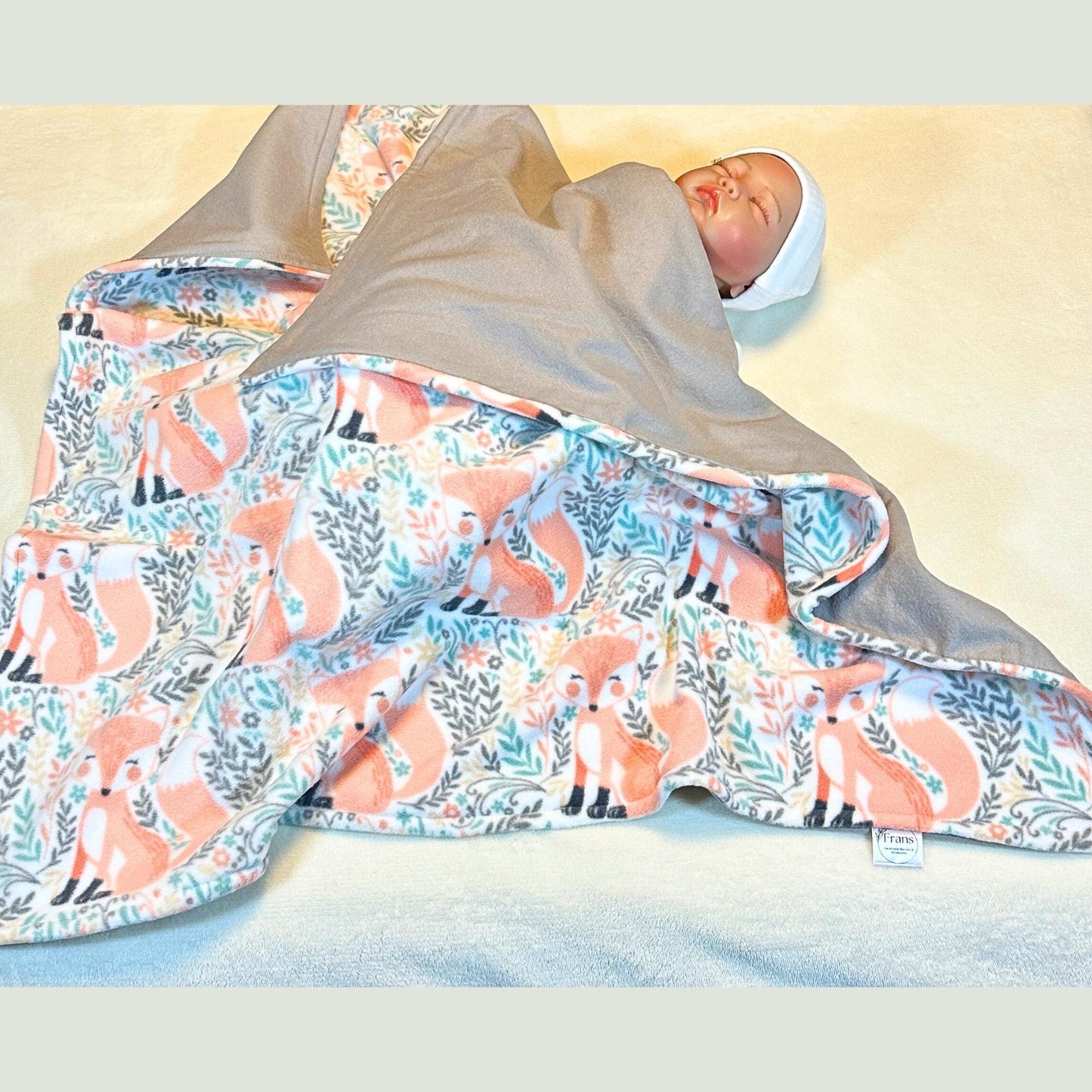 Cute pink fox fleece baby blanket with coordinating gray cotton flannel