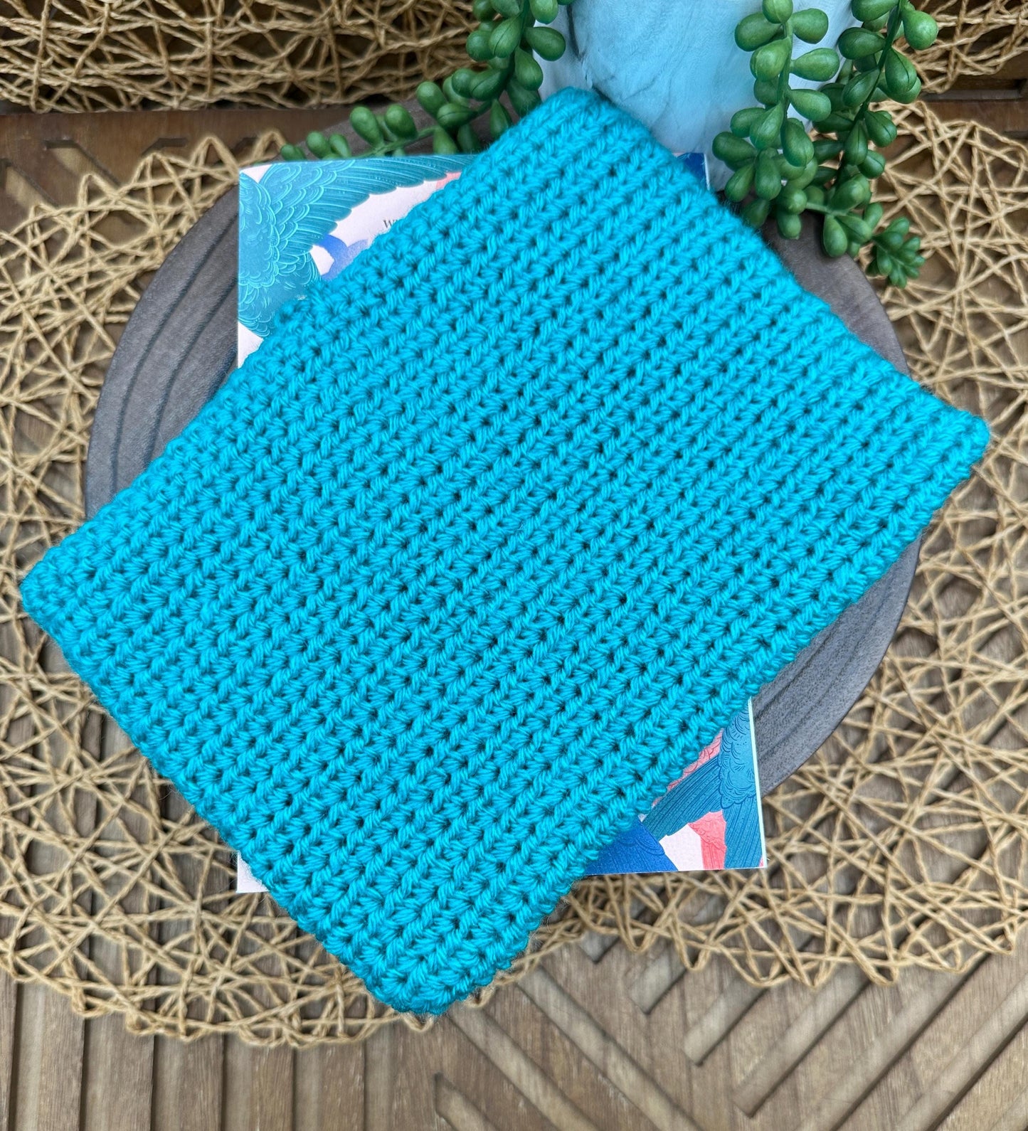 Flower Power Book Sleeve, Soft Crochet in Teal Blue Yarn with White Flowers, Secure Wood Button Closure Measures about 9X6"