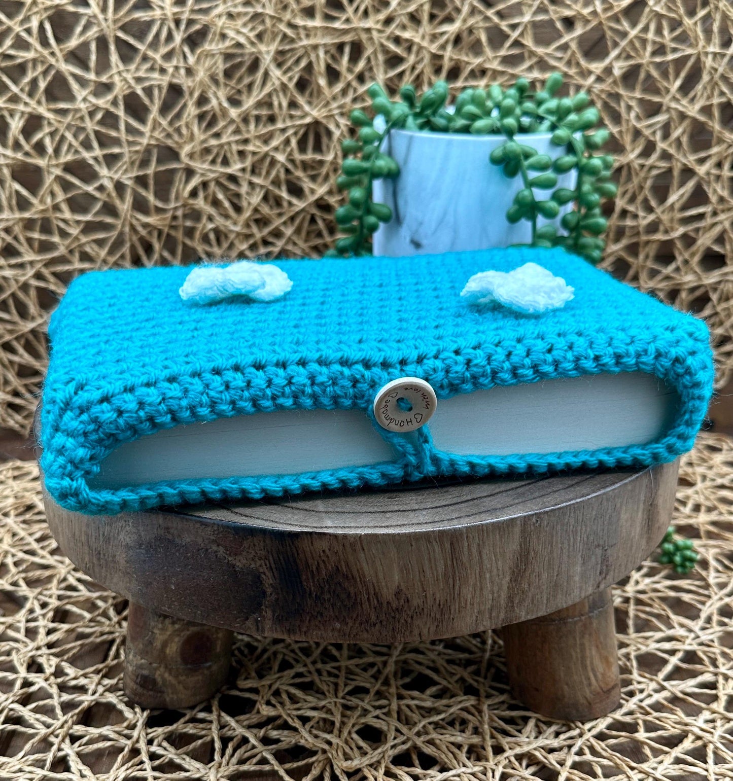 Flower Power Book Sleeve, Soft Crochet in Teal Blue Yarn with White Flowers, Secure Wood Button Closure Measures about 9X6"