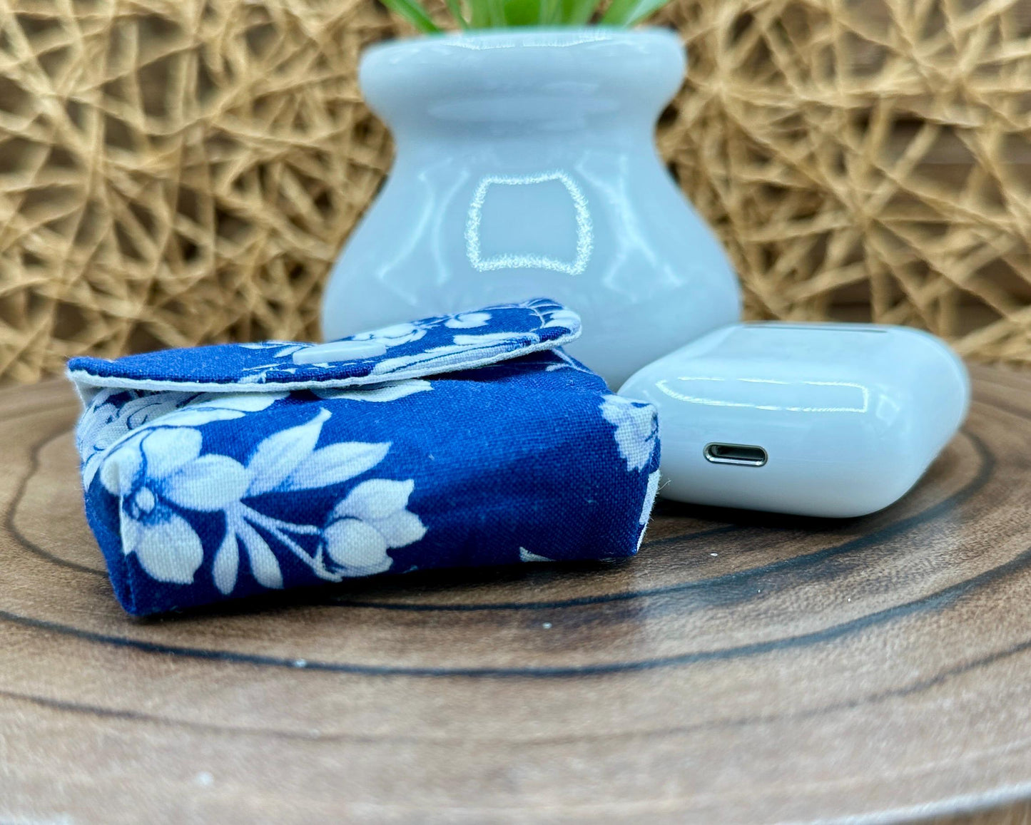 Wireless earbud case, Elegant Navy fabric with White flowers with snap closure and swivel clasp for protection and convenience, 3X3X.75"