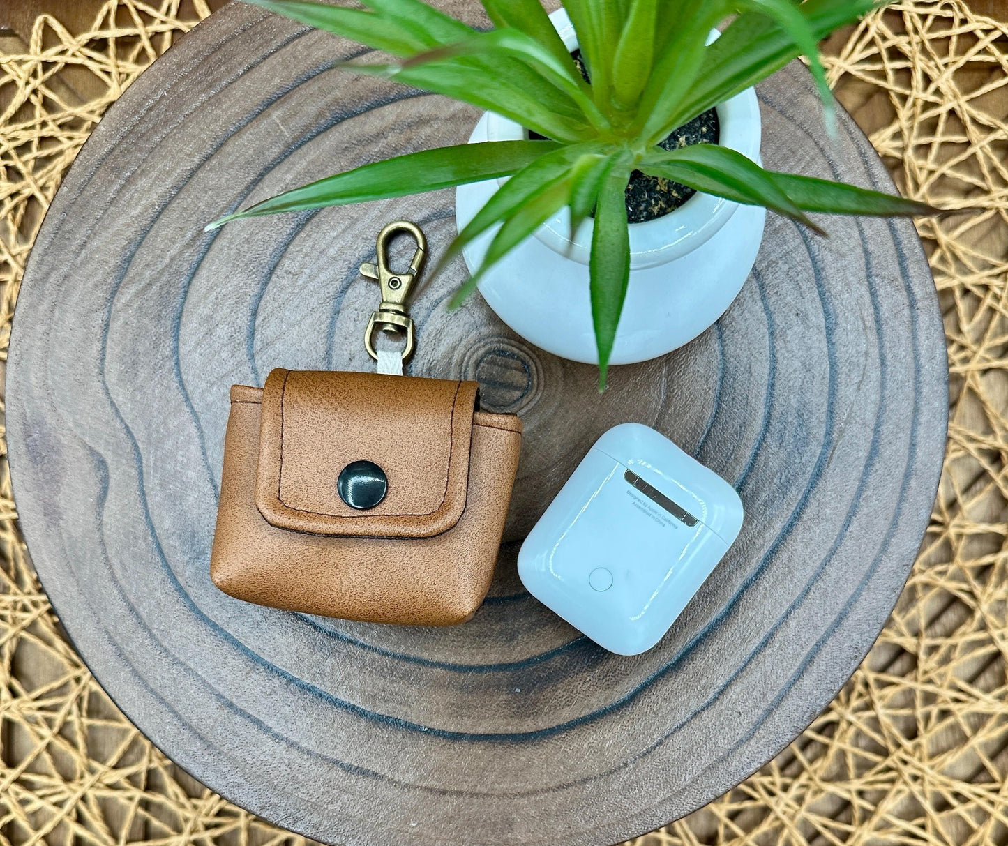 Brown Faux Leather Wireless earbud case, compatible with AirPods, snap closure swivel clasp included for easy and secure carry, 3X3X.75"