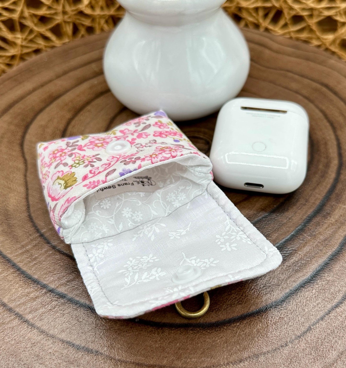 Wireless earbud case, Dainty Lilac and Pink floral fabric with snap closure and swivel clasp for added protection and convenience, 3X3X.75"