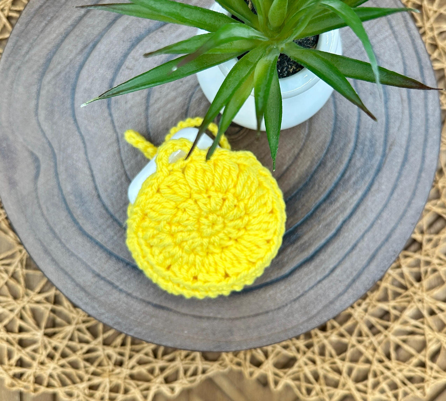 Yellow Crocheted Wireless earbud case, compatible with AirPods, measures 3.5 T 3.5 H .25 D, Pretty Round Design