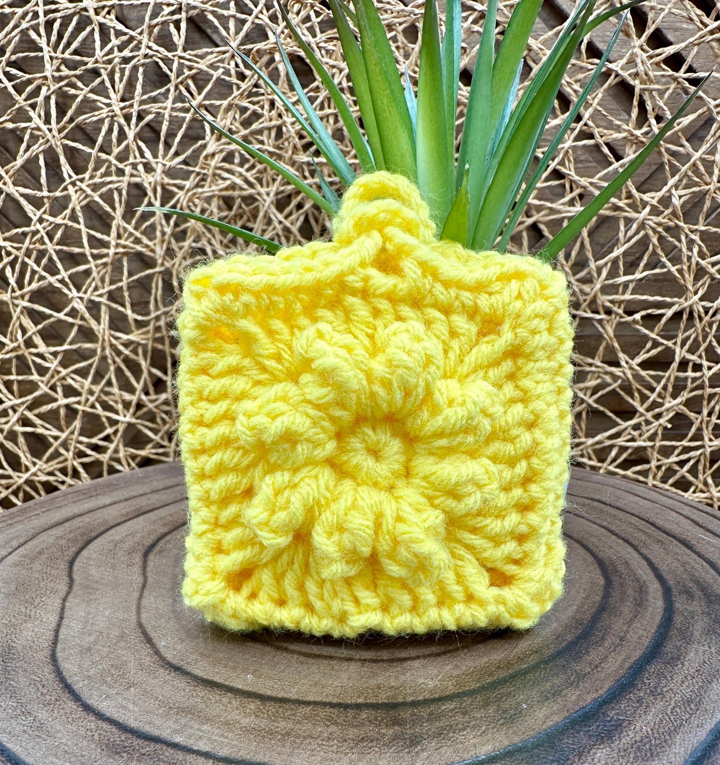 Yellow Crocheted Wireless earbud case, compatible with AirPods, measures 3 T 3 H .25 D, Pretty Raised Flower Granny Square Design