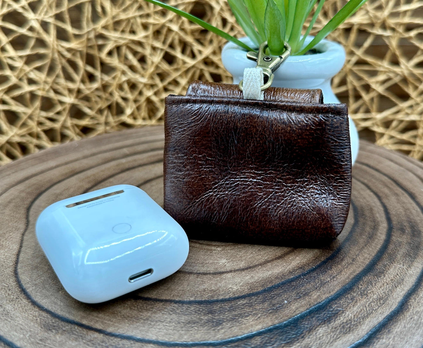 Brown Faux Leather Wireless earbud case, compatible with AirPods, snap closure swivel clasp included for easy and secure carry, 3X3X.75"