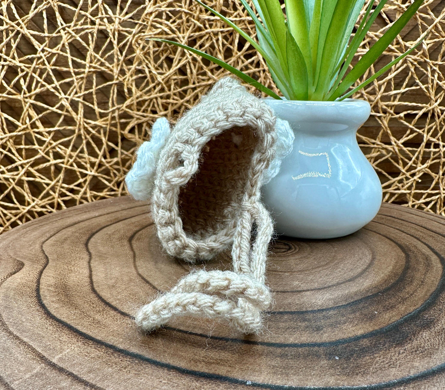 Beige Crocheted Wireless earbud case, compatible with AirPods, measures 3.25 W 2.75 H .5 D