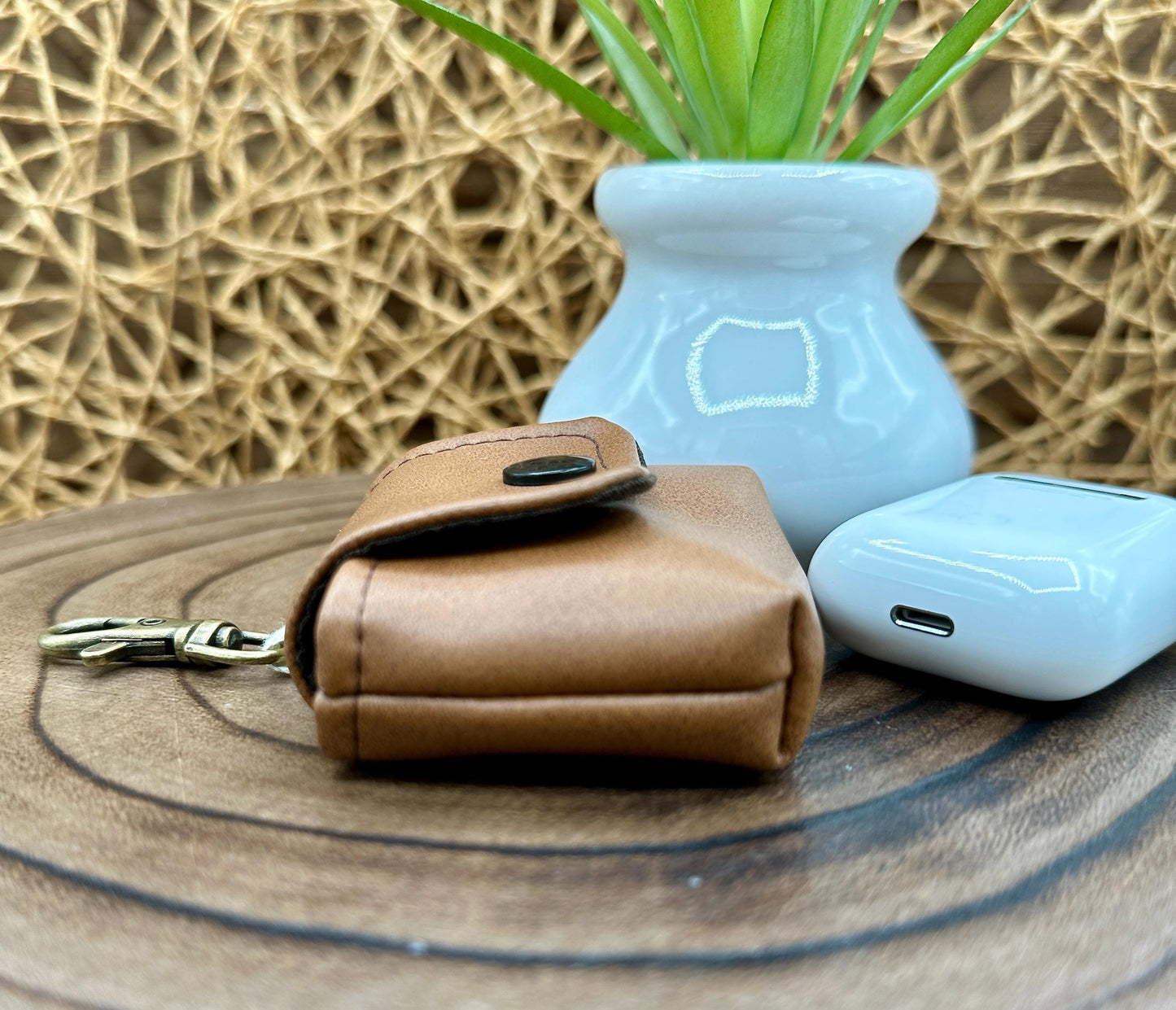 Brown Faux Leather Wireless earbud case, compatible with AirPods, snap closure swivel clasp included for easy and secure carry, 3X3X.75"