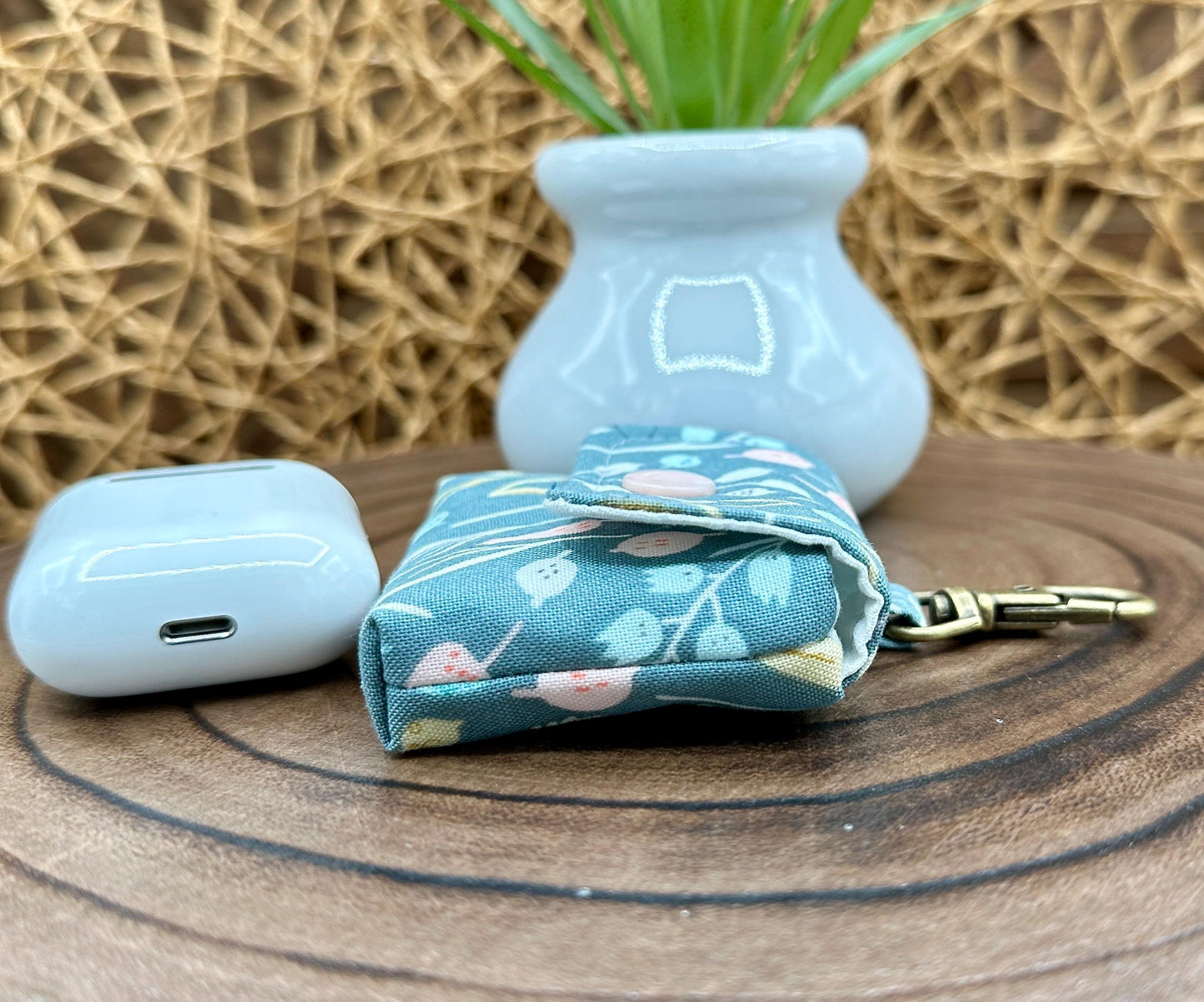 Wireless earbud case, Boho Green Floral fabric with snap closure and swivel clasp for protection and convenience, 3X3X.75"