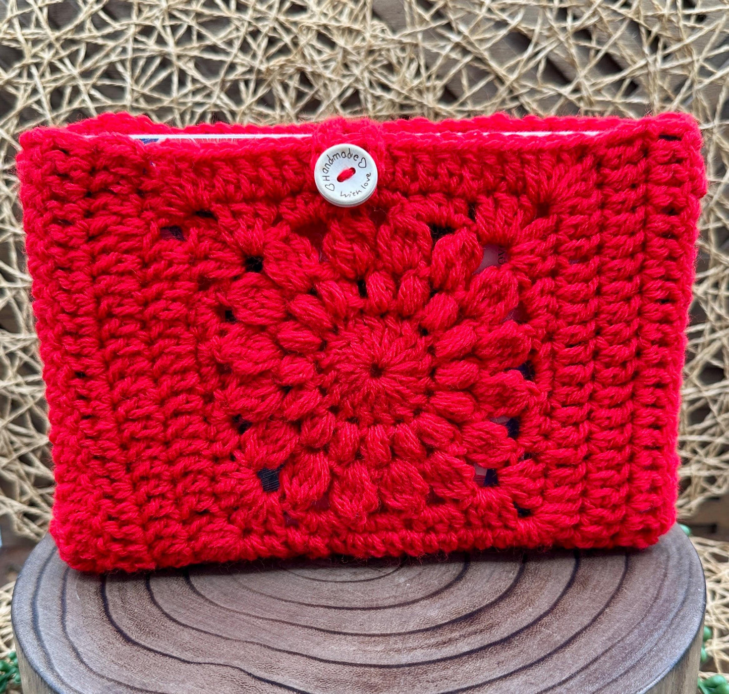 Book Sleeve Soft Crochet in Red Yarn Featuring a Classic Floral Granny Square Design Secure Wood Button Closure, Measures about 9X6"