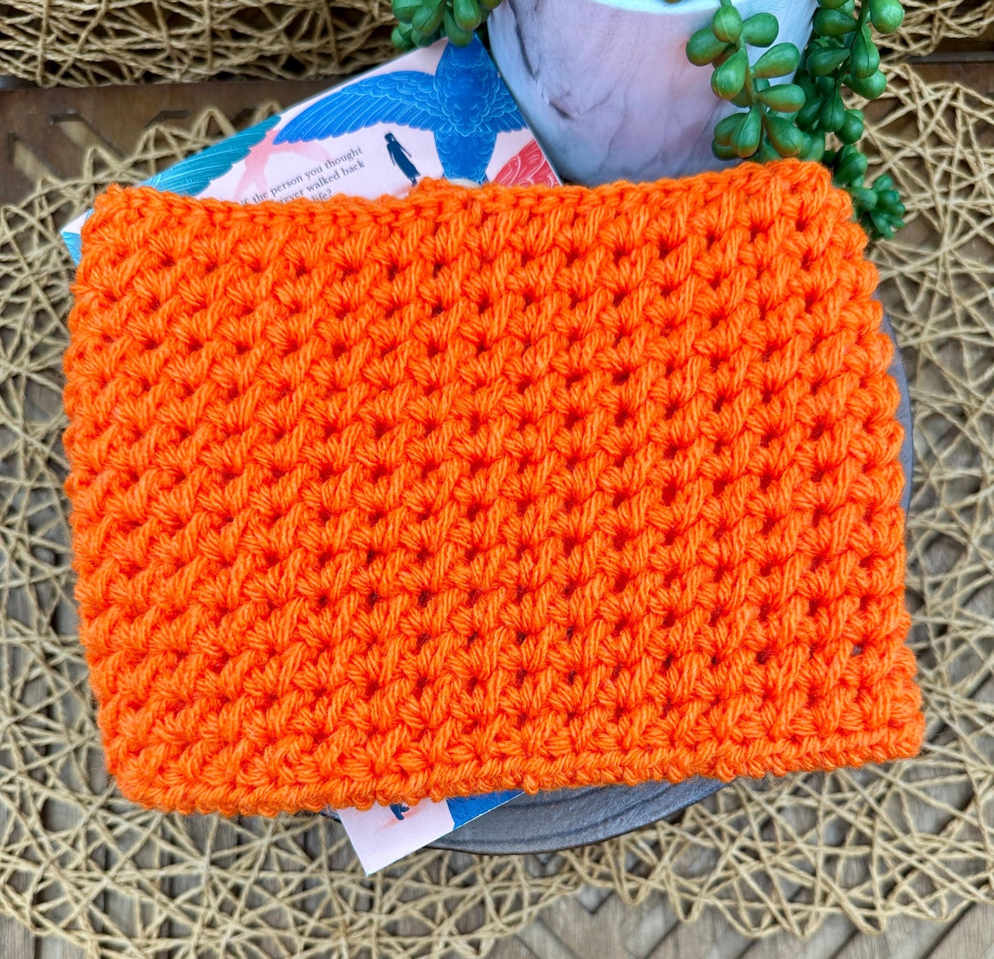 Flower Power Book Sleeve, Soft Crochet in Orange Yarn with White Flowers, Secure Wood Button Closure Measures about 8.5 X6.5"