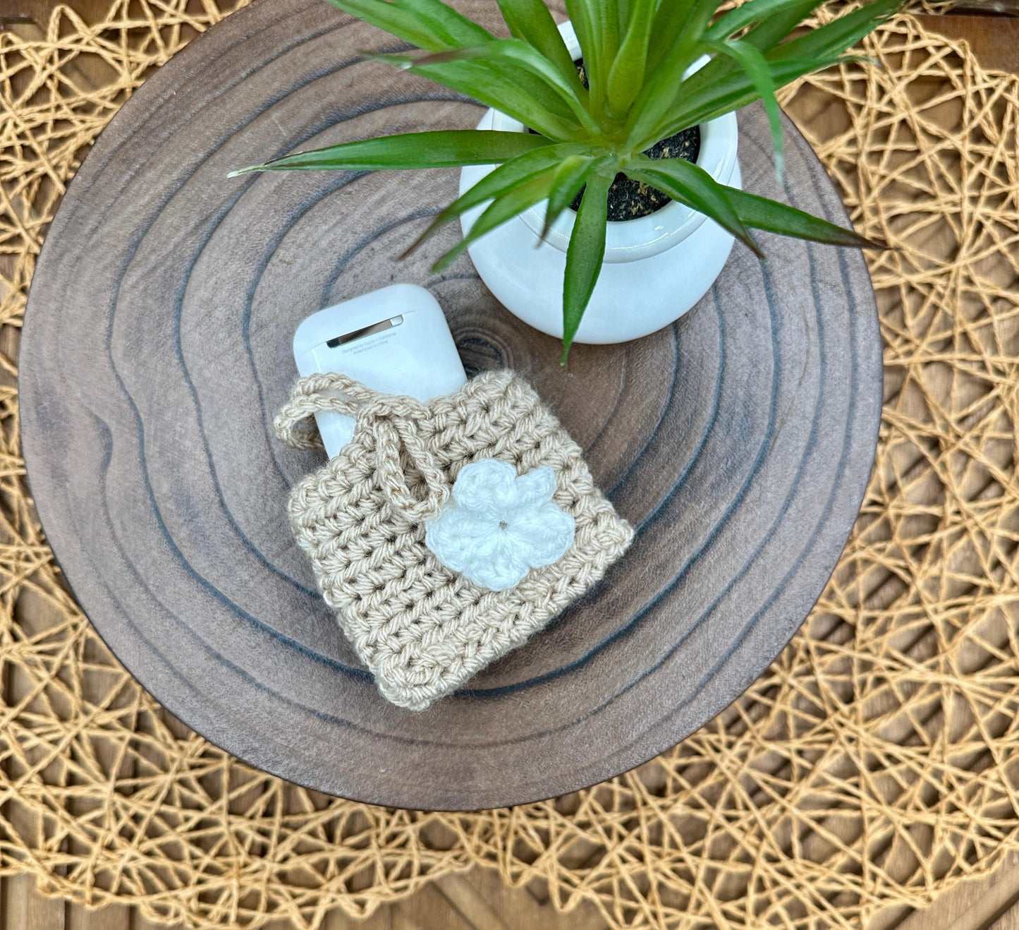 Beige Crocheted Wireless earbud case, compatible with AirPods, measures 3.25 W 2.75 H .5 D