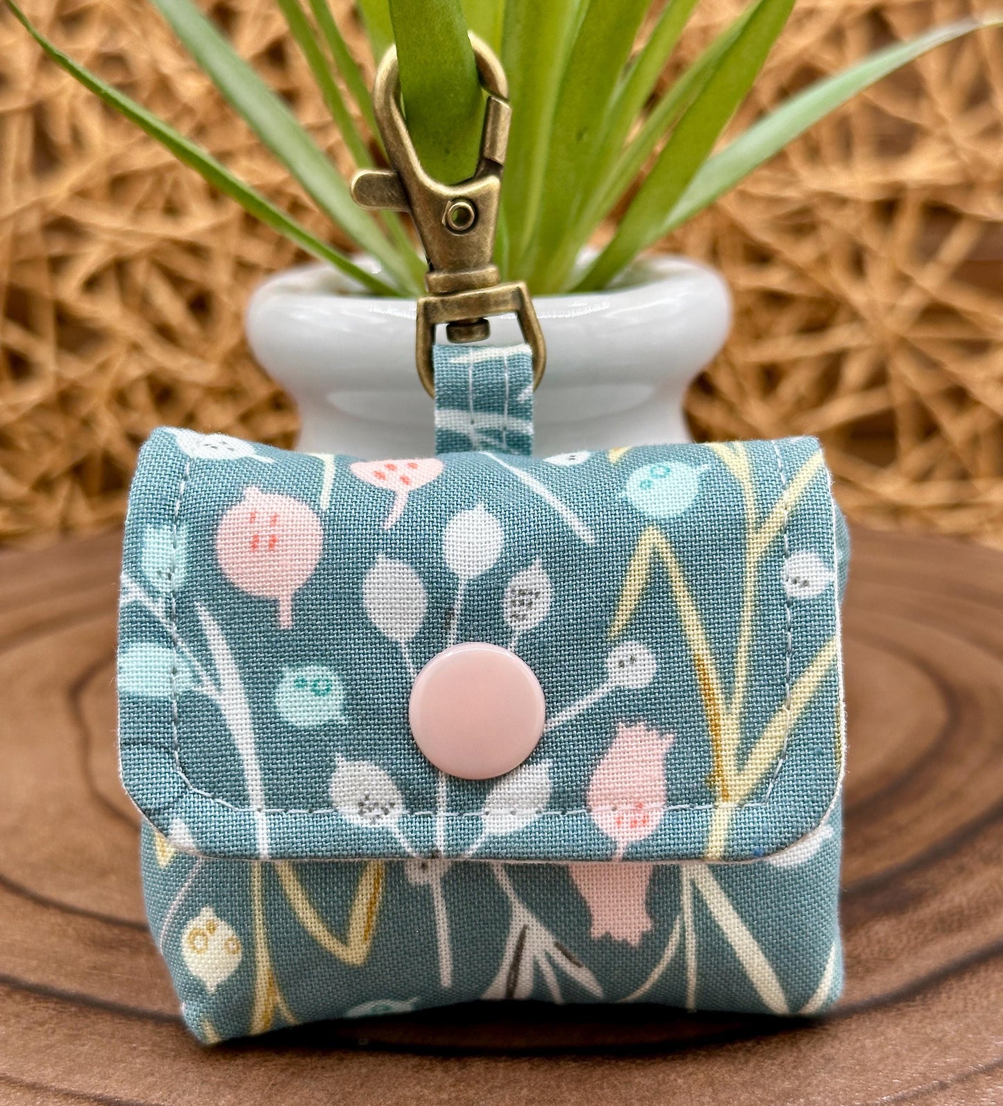 Wireless earbud case, Boho Green Floral fabric with snap closure and swivel clasp for protection and convenience, 3X3X.75"