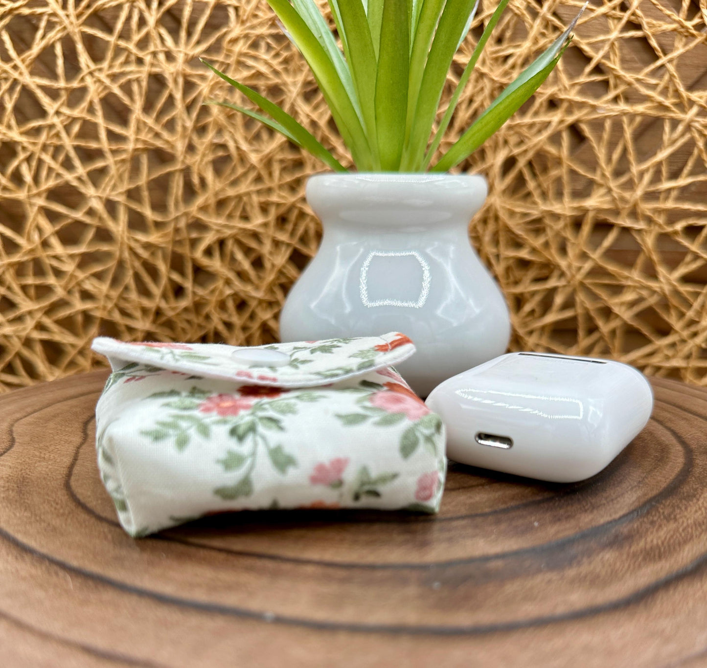 Wireless earbud case, Dainty Rust and Pink floral fabric with snap closure and swivel clasp for added protection and convenience, 3X3X.75"