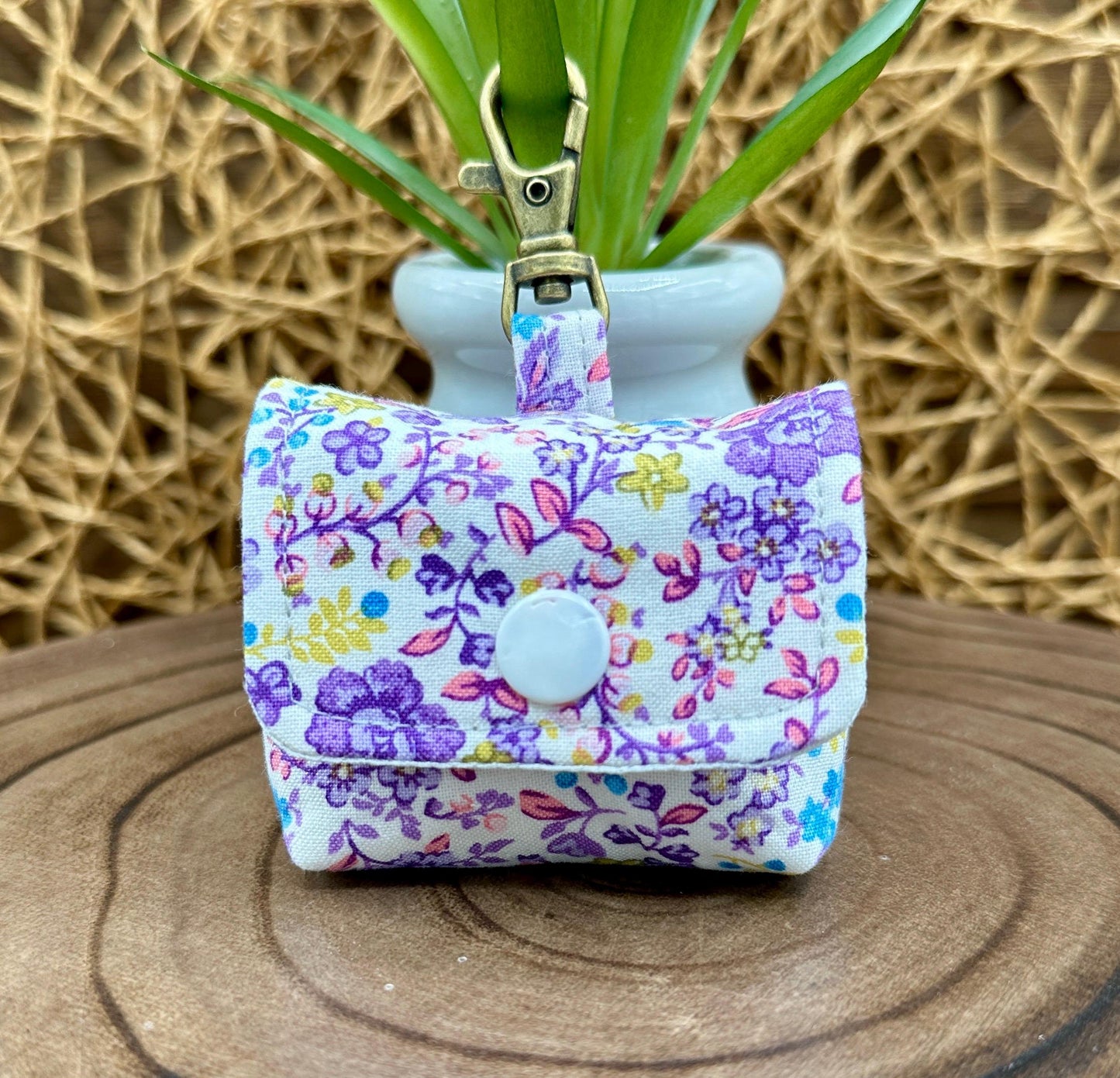 Wireless earbud case, Cute Purple and Yellow floral fabric with snap closure and swivel clasp for added protection and convenience, 3X3X.75"
