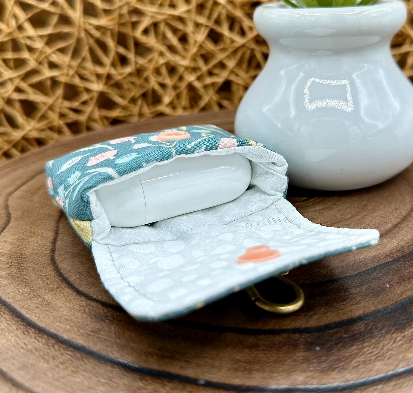 Wireless earbud case, Boho Green Floral fabric with snap closure and swivel clasp for protection and convenience, 3X3X.75"