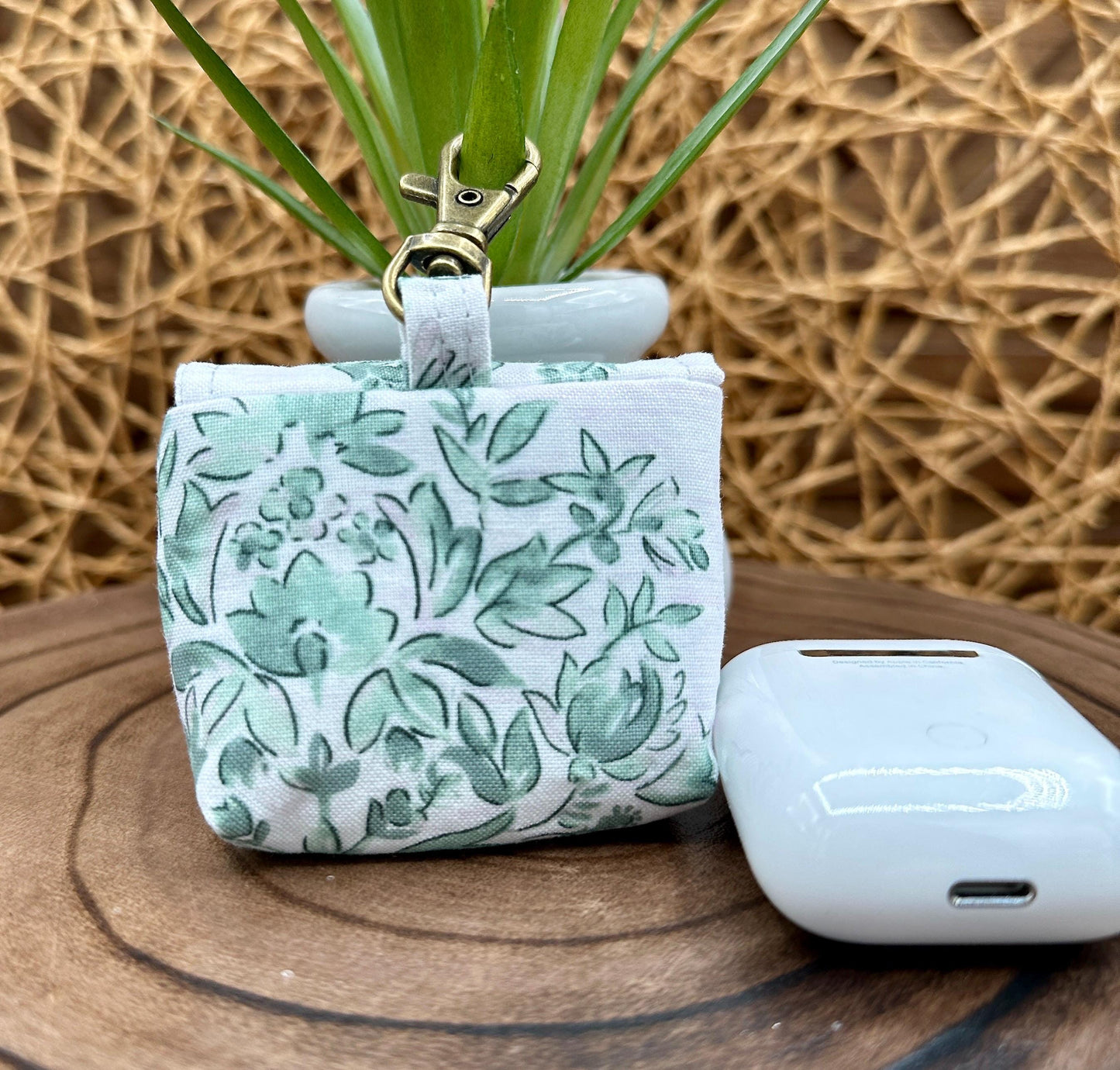 Wireless earbud case, Elegant Green Floral fabric with snap closure and swivel clasp for protection and convenience, 3X3X.75"