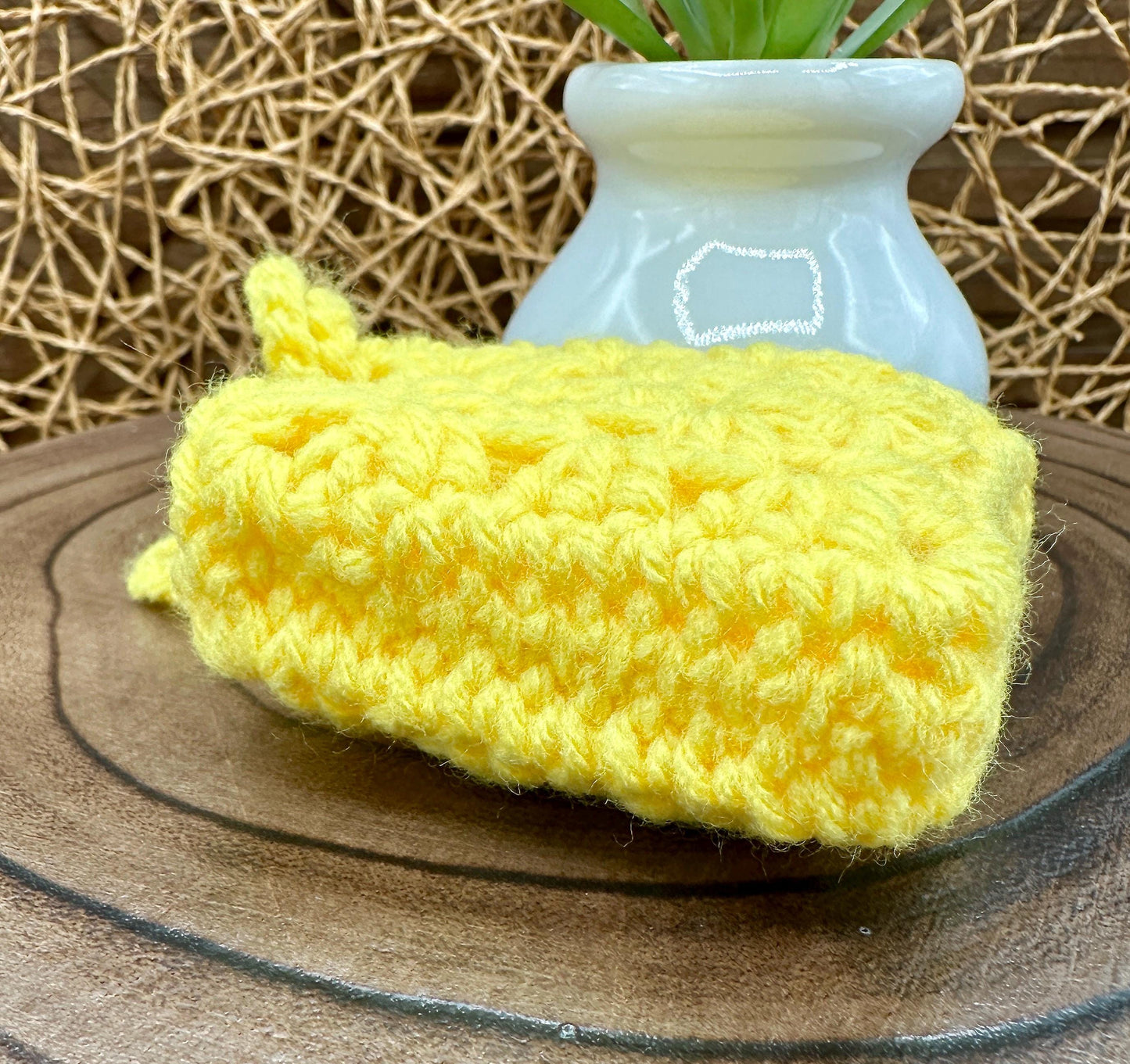 Yellow Crocheted Wireless earbud case, compatible with AirPods, measures 3 T 3 H .25 D, Pretty Granny Square Design