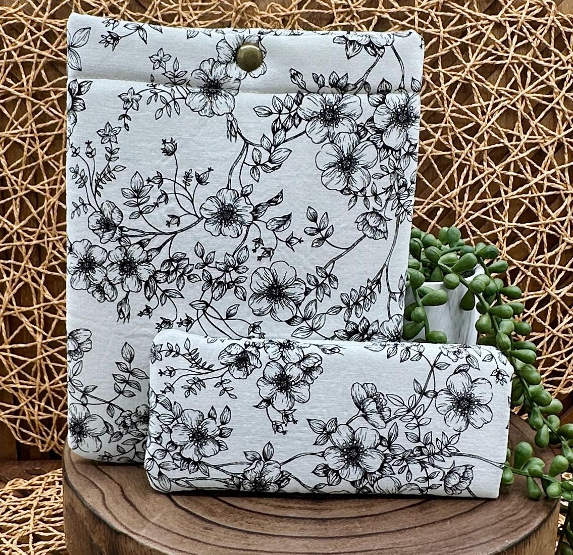 black floral kindle paperwhite sleeve and eyeglass set