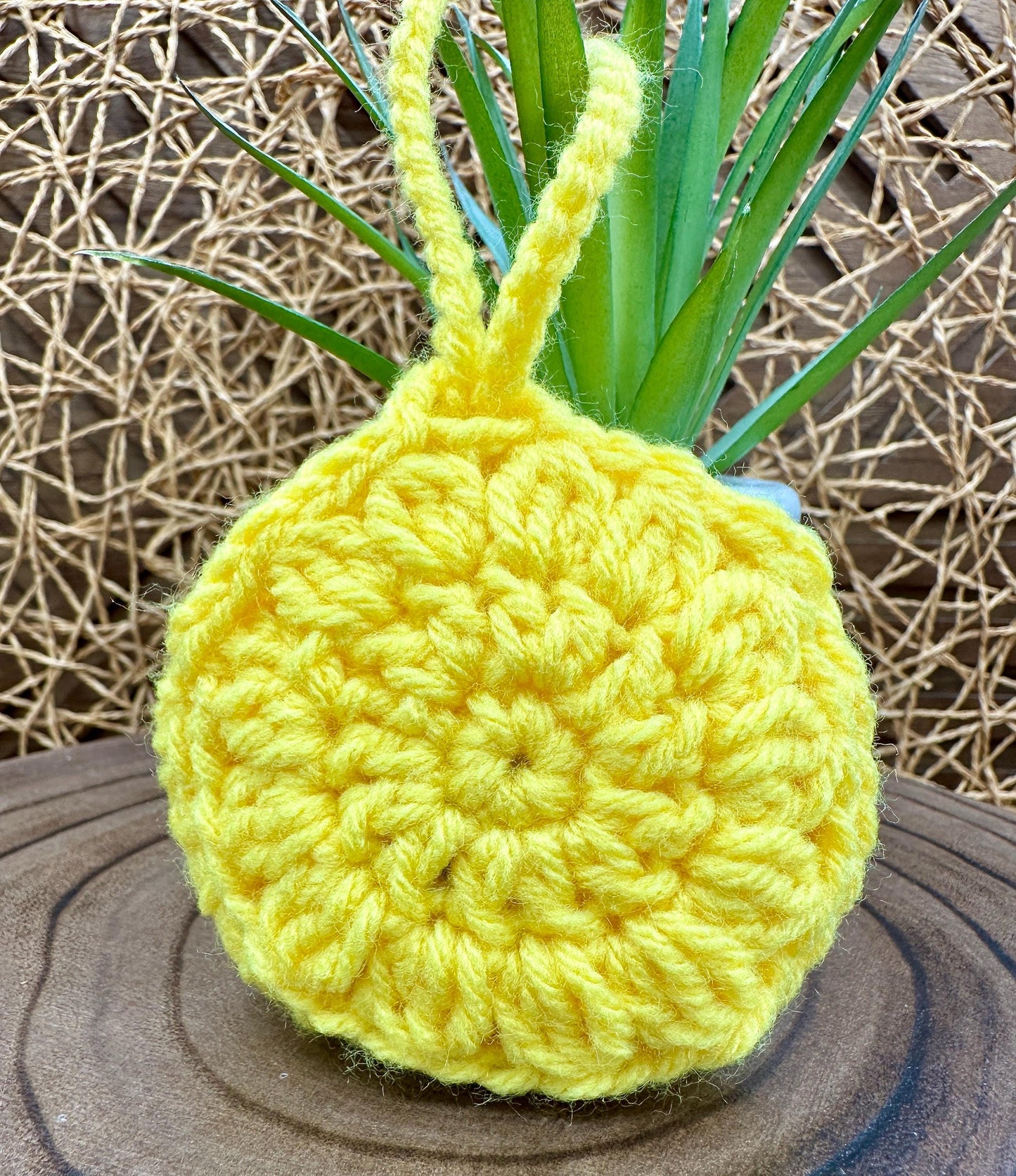 Yellow Crocheted Wireless earbud case, compatible with AirPods, measures 3.5 T 3.5 H .25 D, Pretty Round Design
