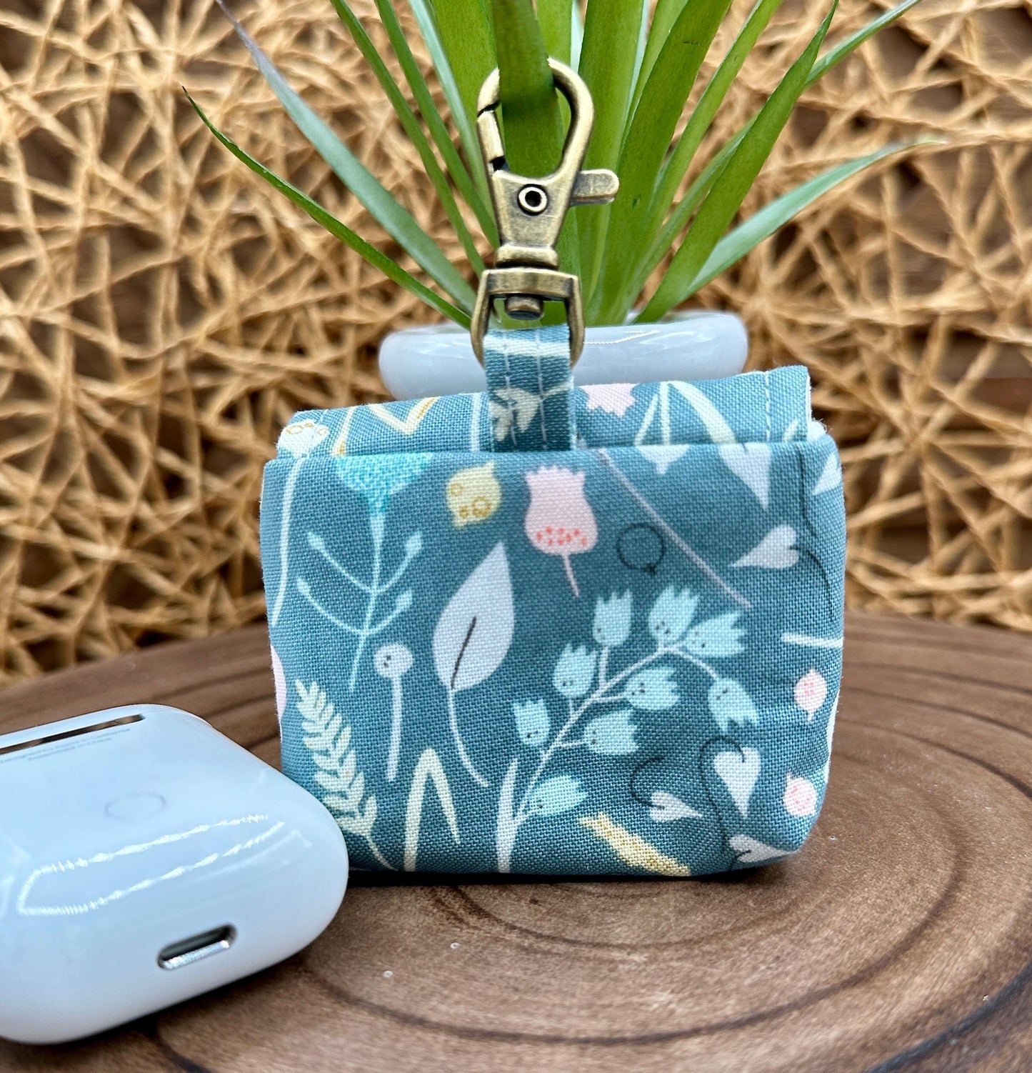 Wireless earbud case, Boho Green Floral fabric with snap closure and swivel clasp for protection and convenience, 3X3X.75"