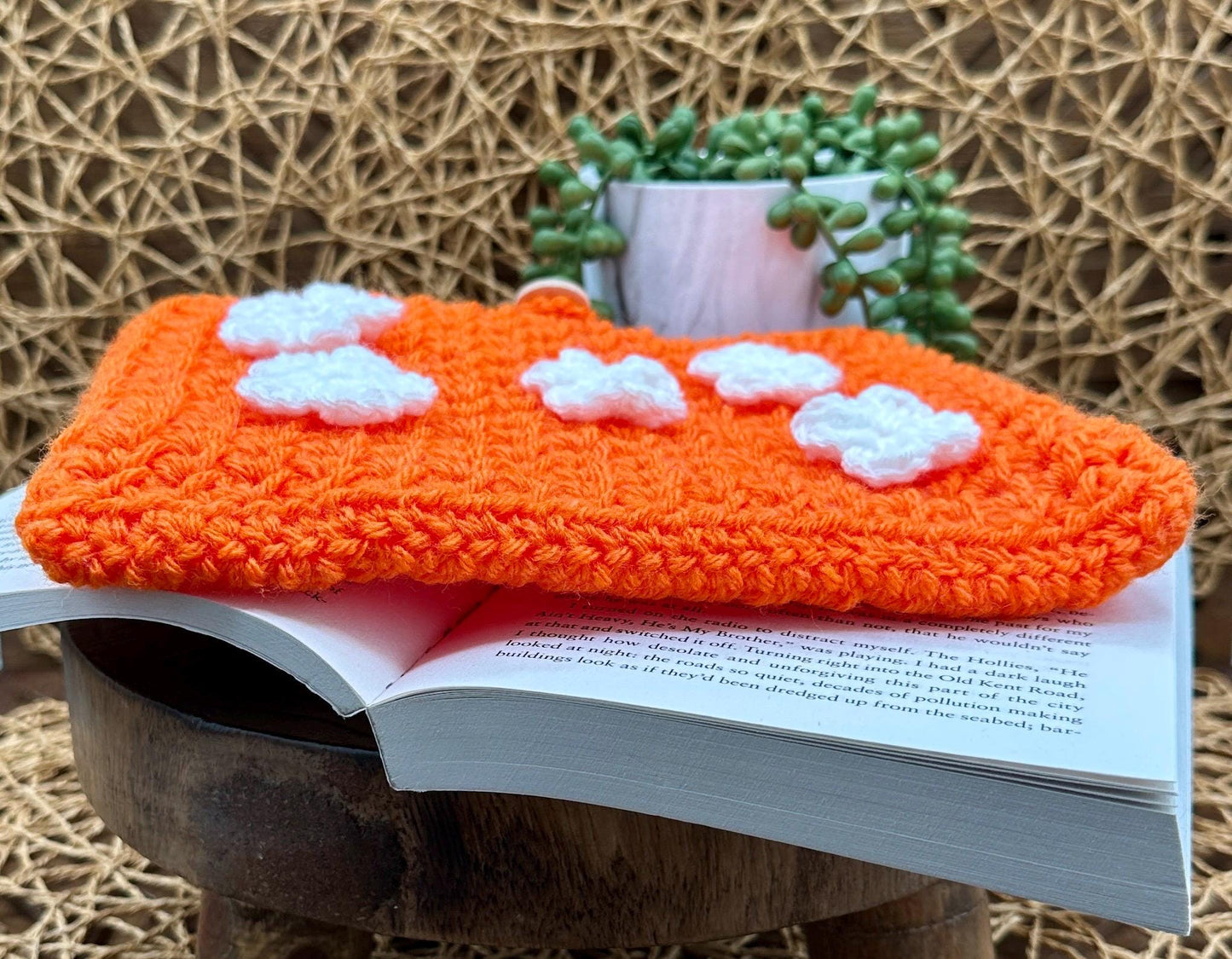 Flower Power Book Sleeve, Soft Crochet in Orange Yarn with White Flowers, Secure Wood Button Closure Measures about 8.5 X6.5"