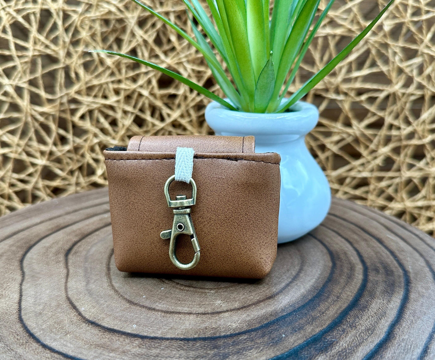 Brown Faux Leather Wireless earbud case, compatible with AirPods, snap closure swivel clasp included for easy and secure carry, 3X3X.75"