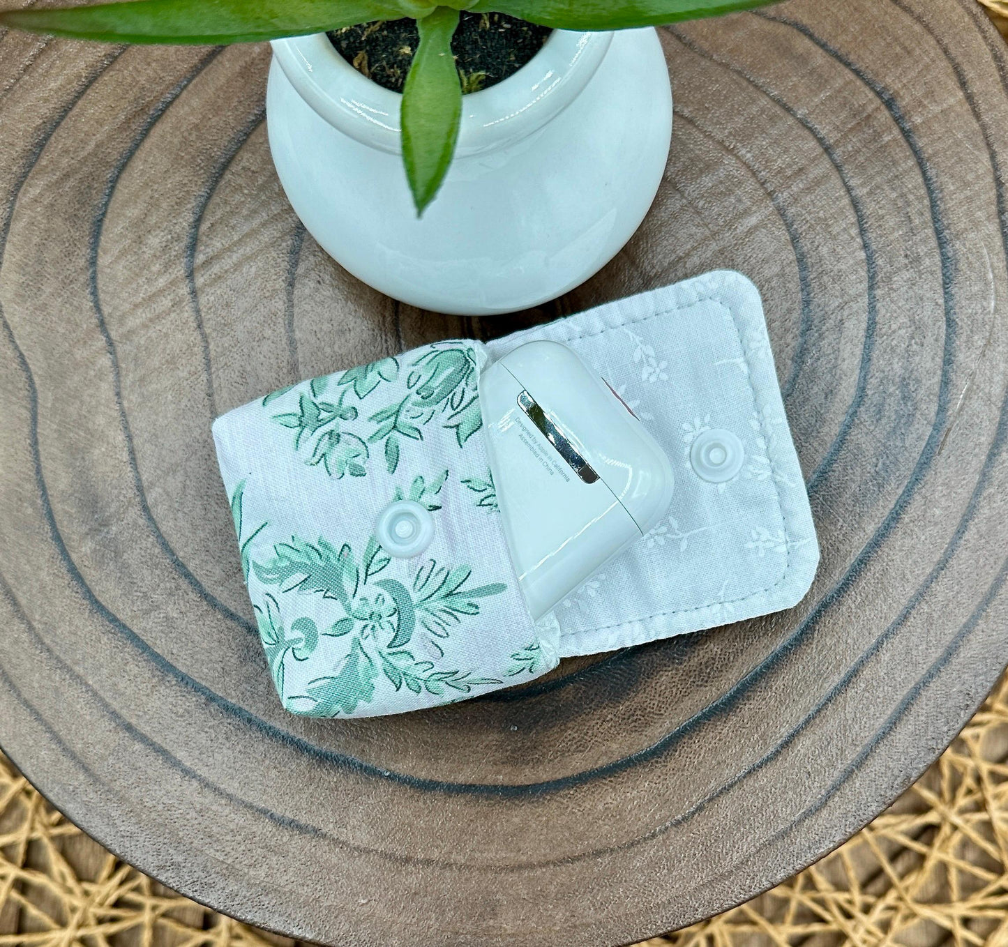 Wireless earbud case, Elegant Green Floral fabric with snap closure and swivel clasp for protection and convenience, 3X3X.75"