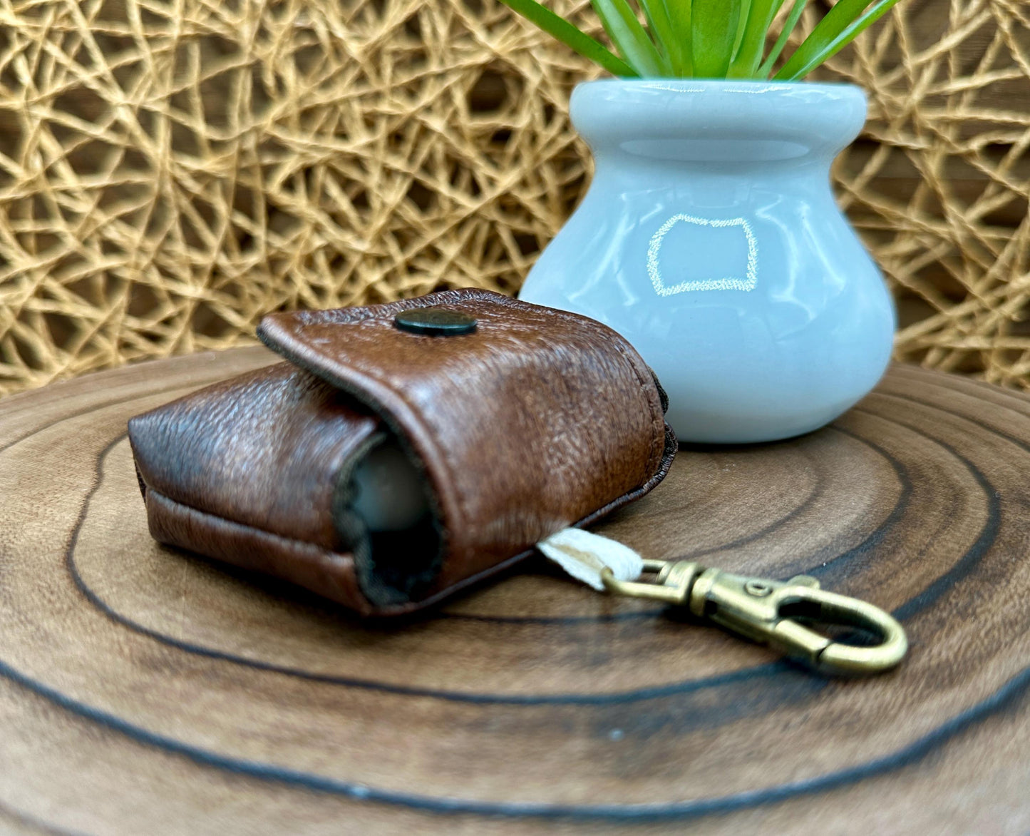 Brown Faux Leather Wireless earbud case, compatible with AirPods, snap closure swivel clasp included for easy and secure carry, 3X3X.75"