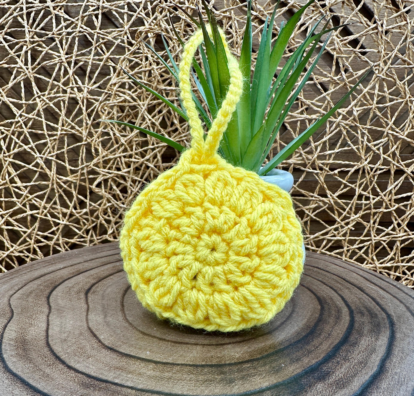 Yellow Crocheted Wireless earbud case, compatible with AirPods, measures 3.5 T 3.5 H .25 D, Pretty Round Design