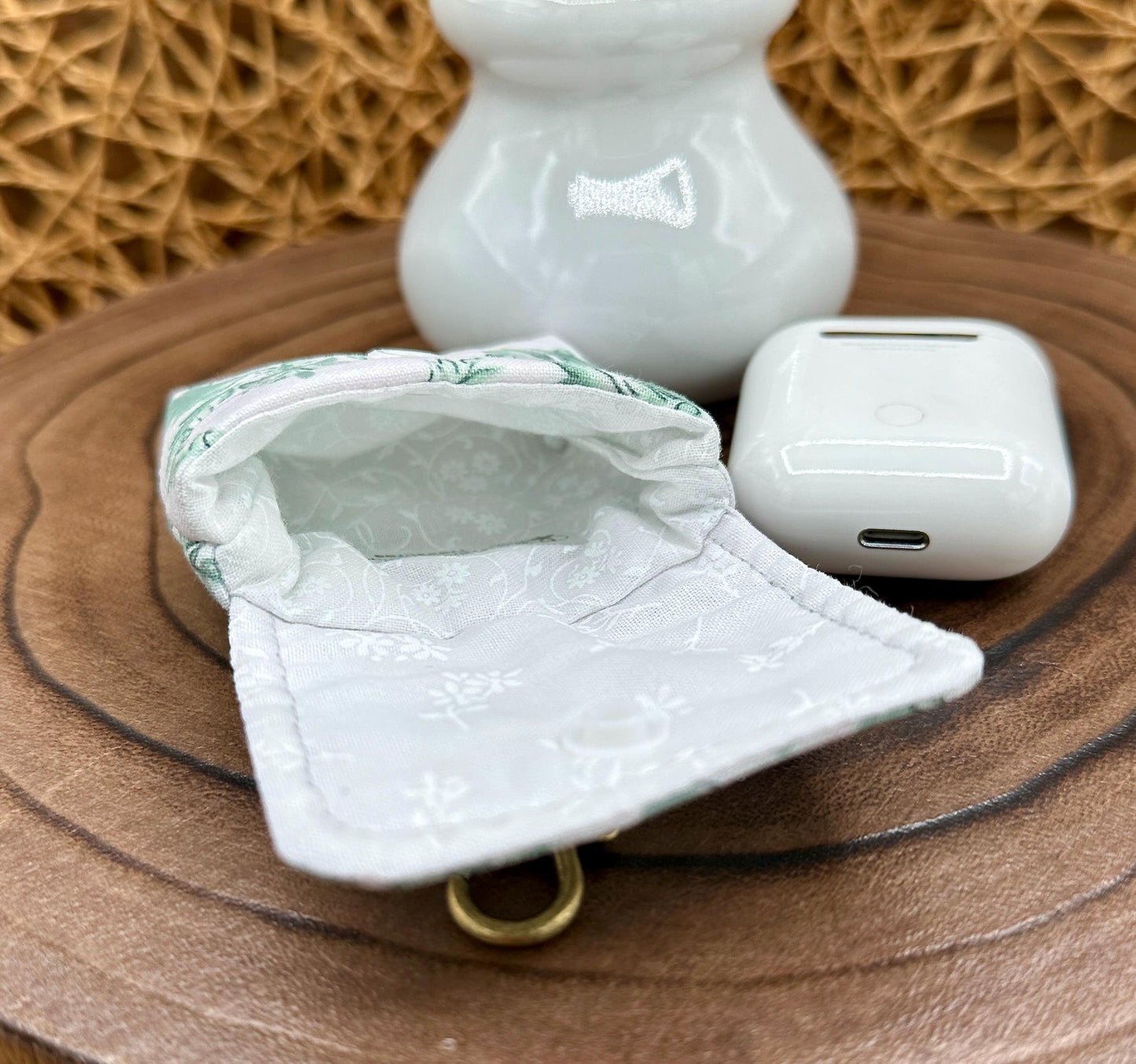 Wireless earbud case, Elegant Green Floral fabric with snap closure and swivel clasp for protection and convenience, 3X3X.75"