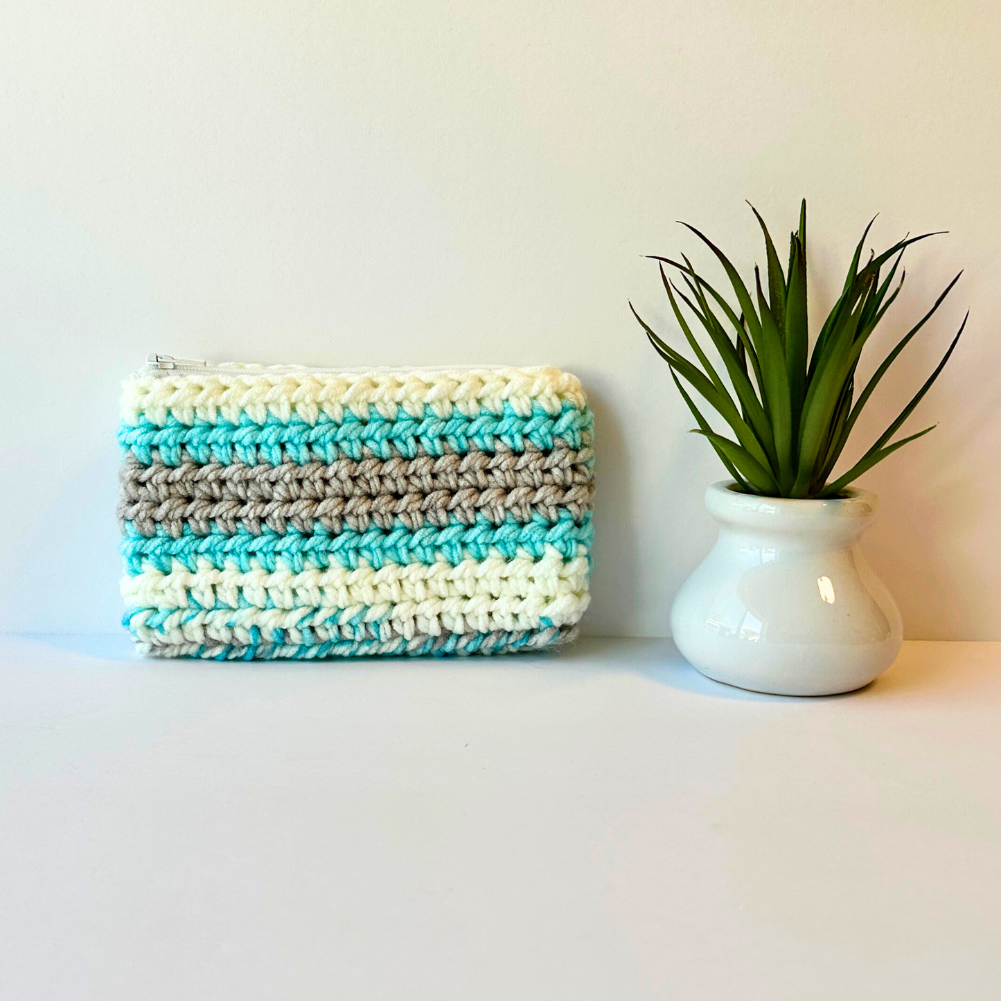Blue Gray and White Crocheted Zip Pouch with Floral Lining