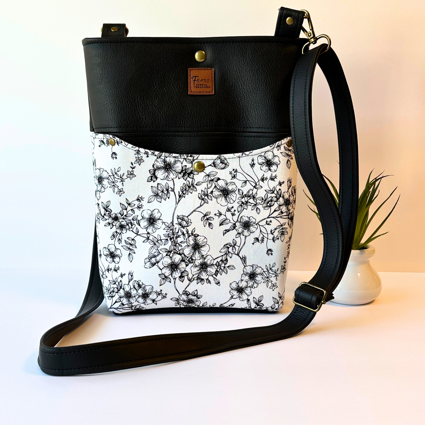 Black Floral Faux Leather Crossbody Bag with Adjustable Strap and Magnetic Snap Closure
