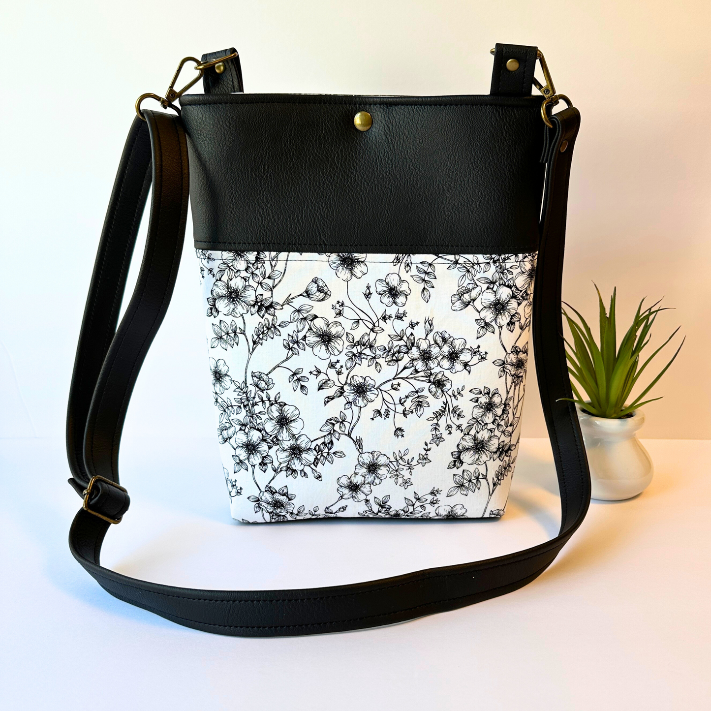 Black Floral Faux Leather Crossbody Bag with Adjustable Strap and Magnetic Snap Closure