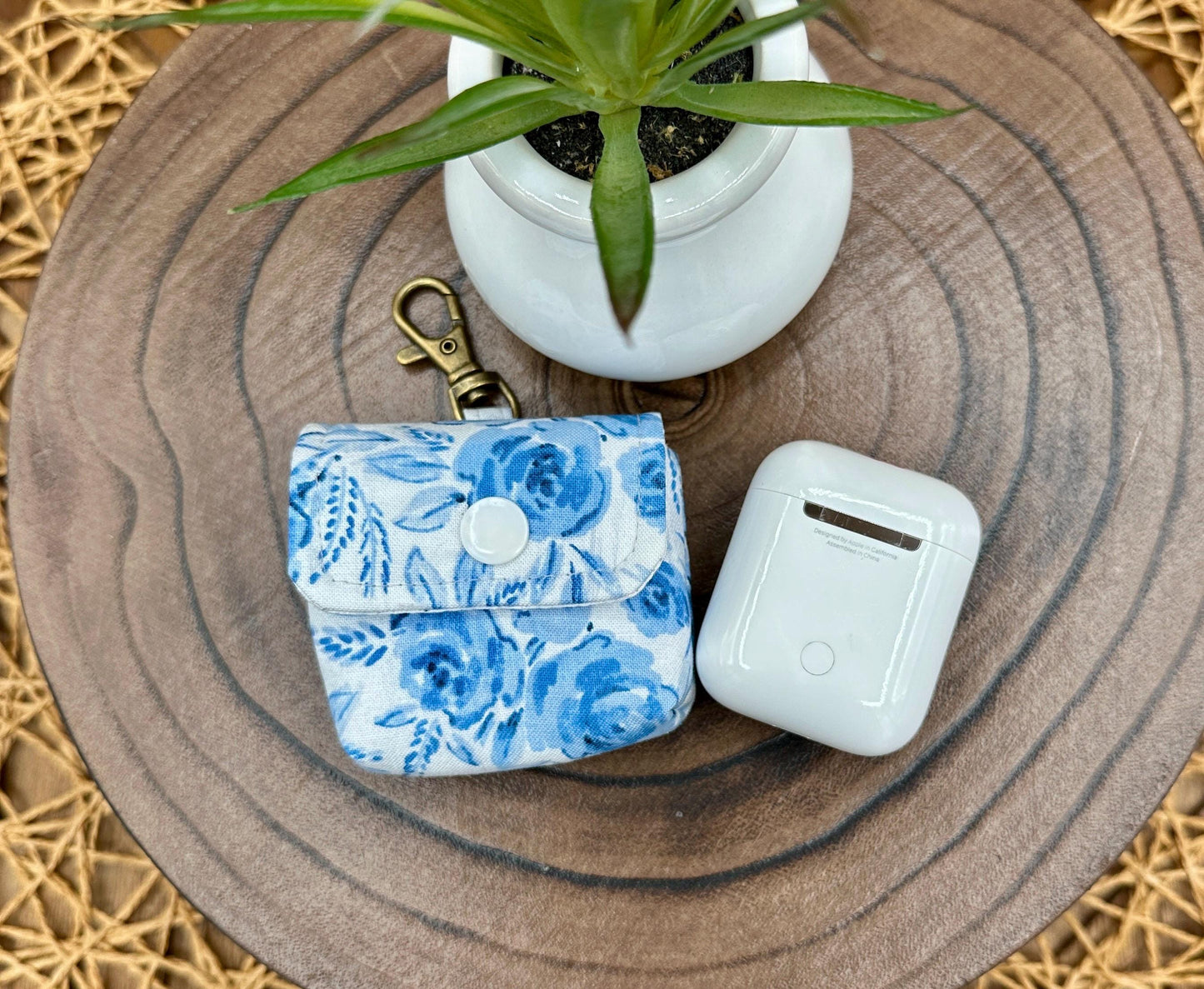 Wireless earbud case, Feminine Blue Floral Fabric with Snap Closure and Swivel Clasp for Stylish Protection and Convenience, 3X3X.75"