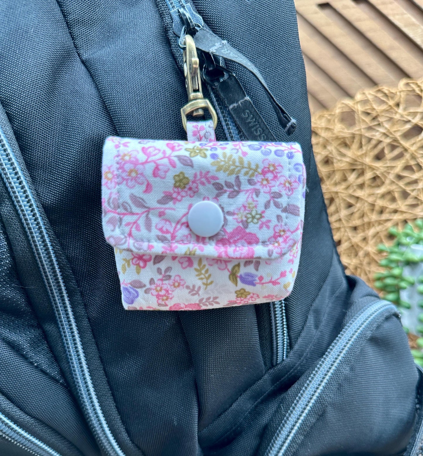 Wireless earbud case, Dainty Lilac and Pink floral fabric with snap closure and swivel clasp for added protection and convenience, 3X3X.75"