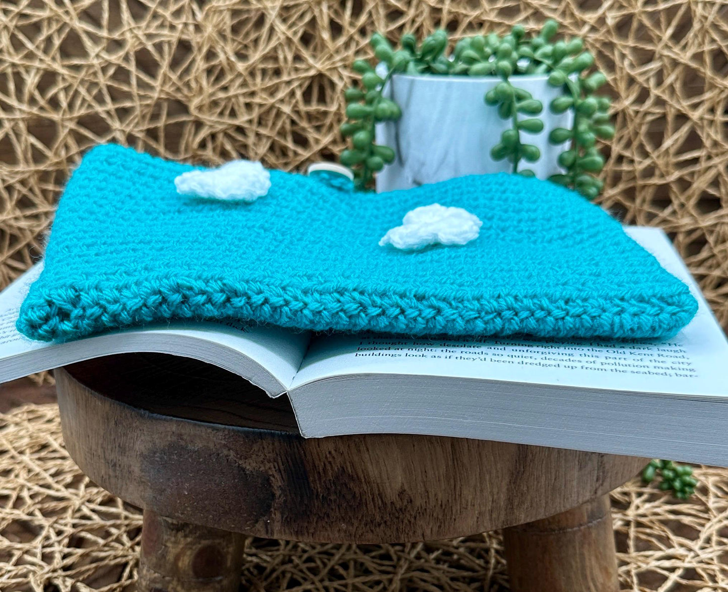 Flower Power Book Sleeve, Soft Crochet in Teal Blue Yarn with White Flowers, Secure Wood Button Closure Measures about 9X6"