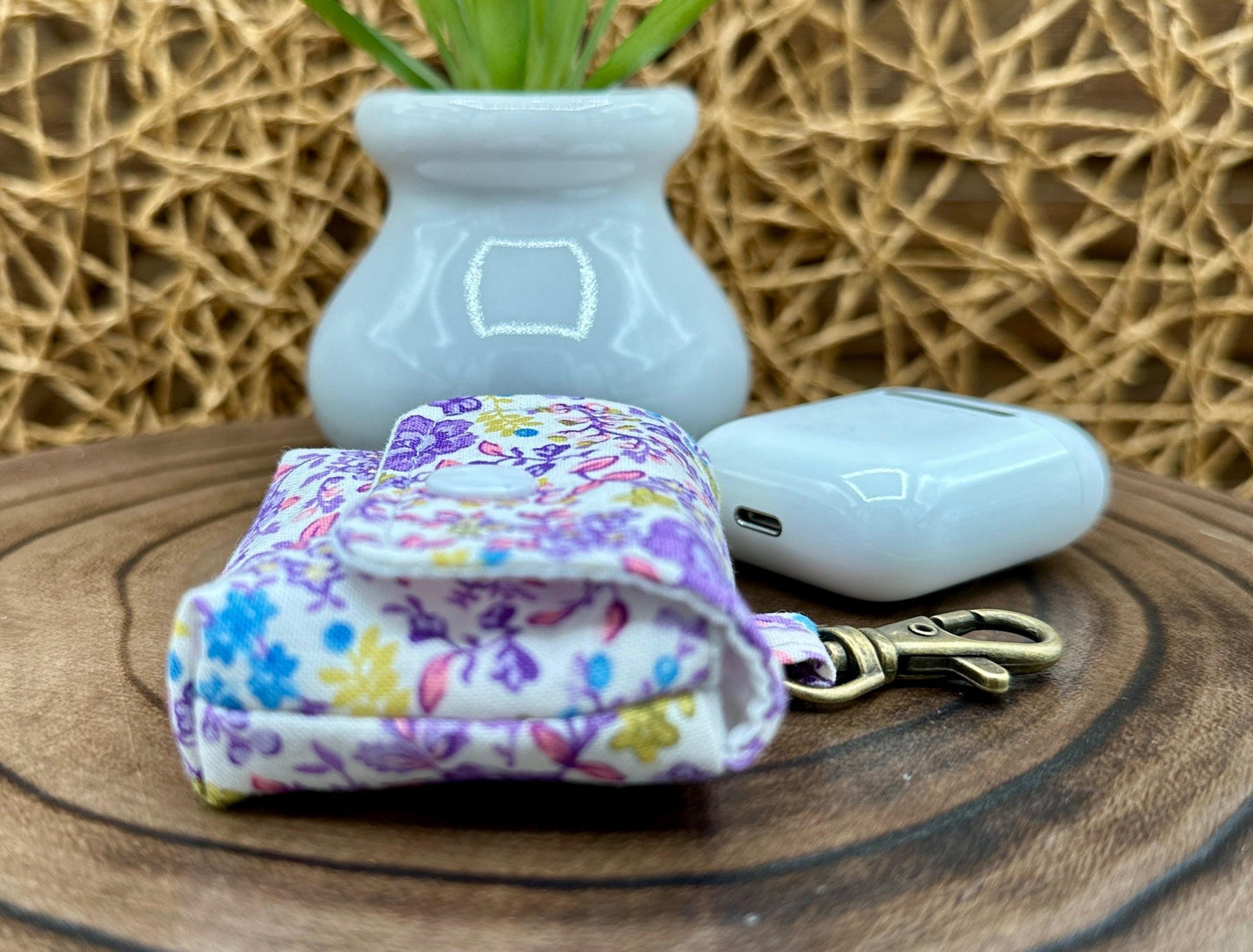 Wireless earbud case, Cute Purple and Yellow floral fabric with snap closure and swivel clasp for added protection and convenience, 3X3X.75"