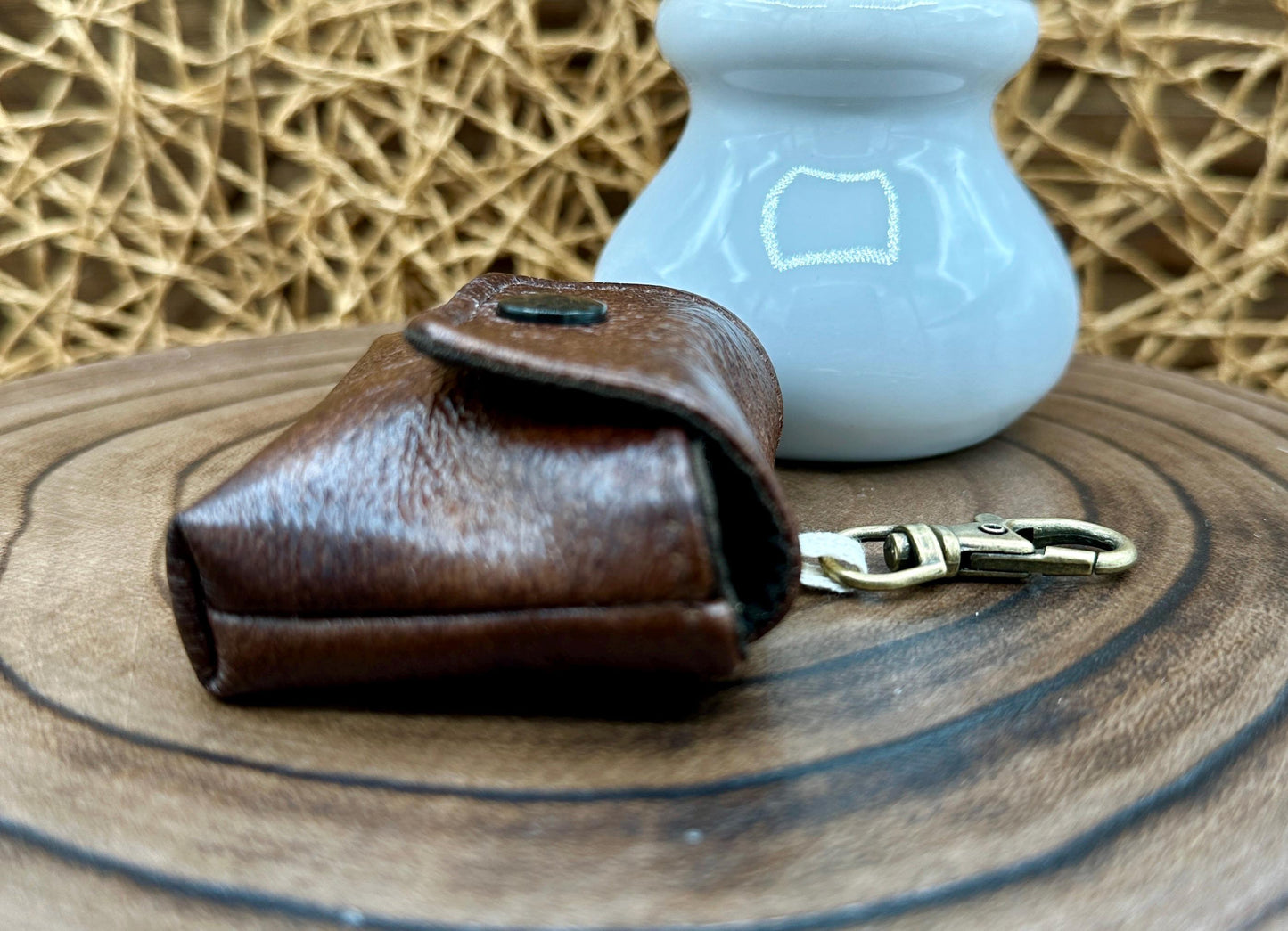 Brown Faux Leather Wireless earbud case, compatible with AirPods, snap closure swivel clasp included for easy and secure carry, 3X3X.75"