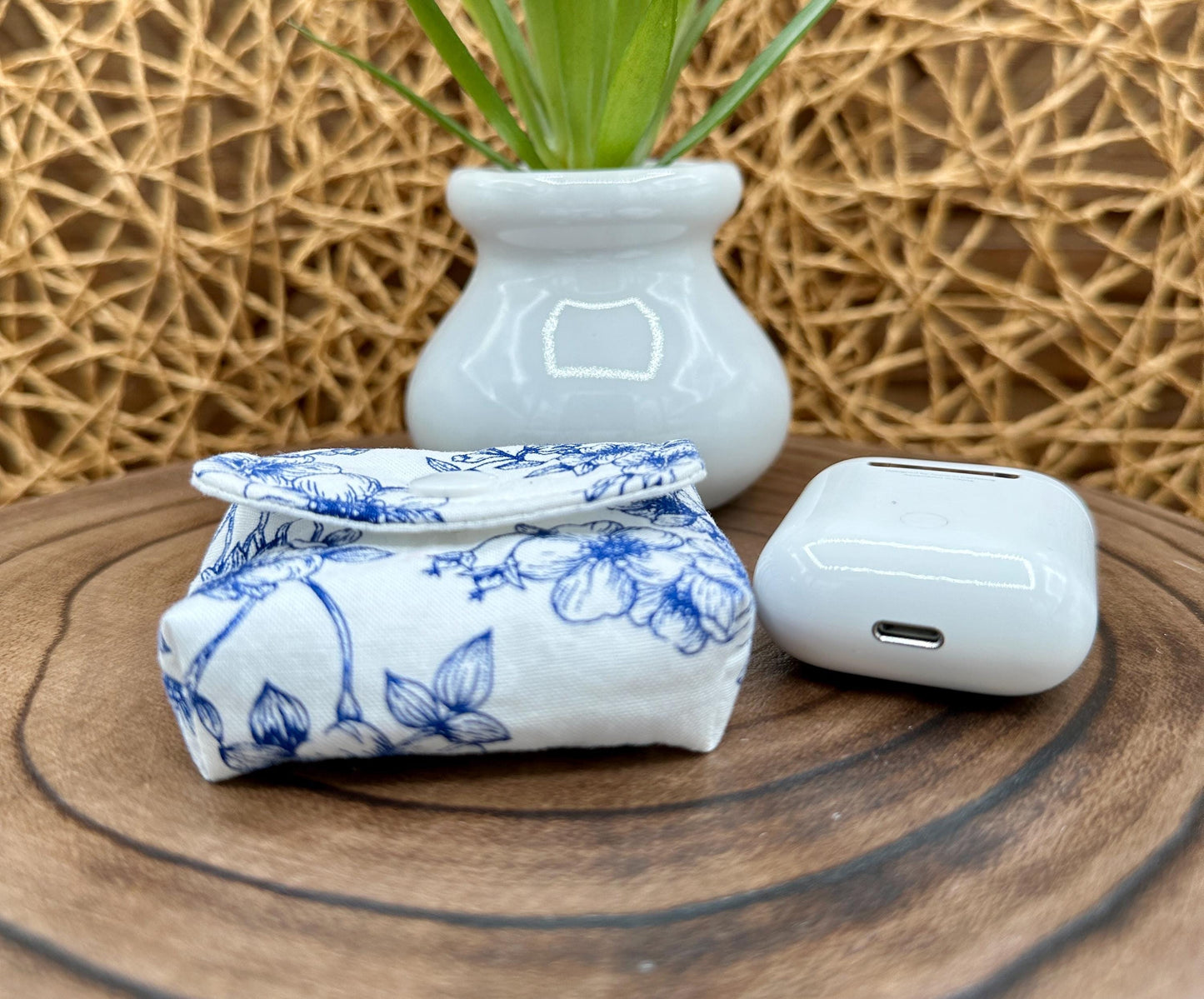 Wireless earbud case, Elegant Navy Floral fabric with snap closure and swivel clasp for added protection and convenience, 3X3X.75"
