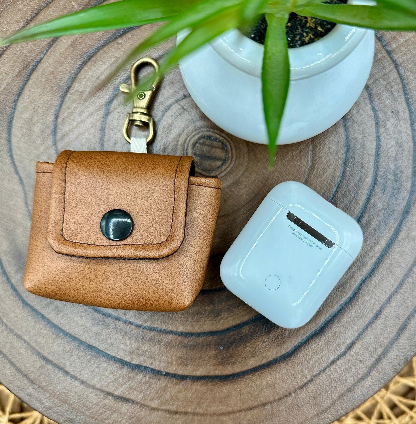 Brown Faux Leather Wireless earbud case, compatible with AirPods, snap closure swivel clasp included for easy and secure carry, 3X3X.75"