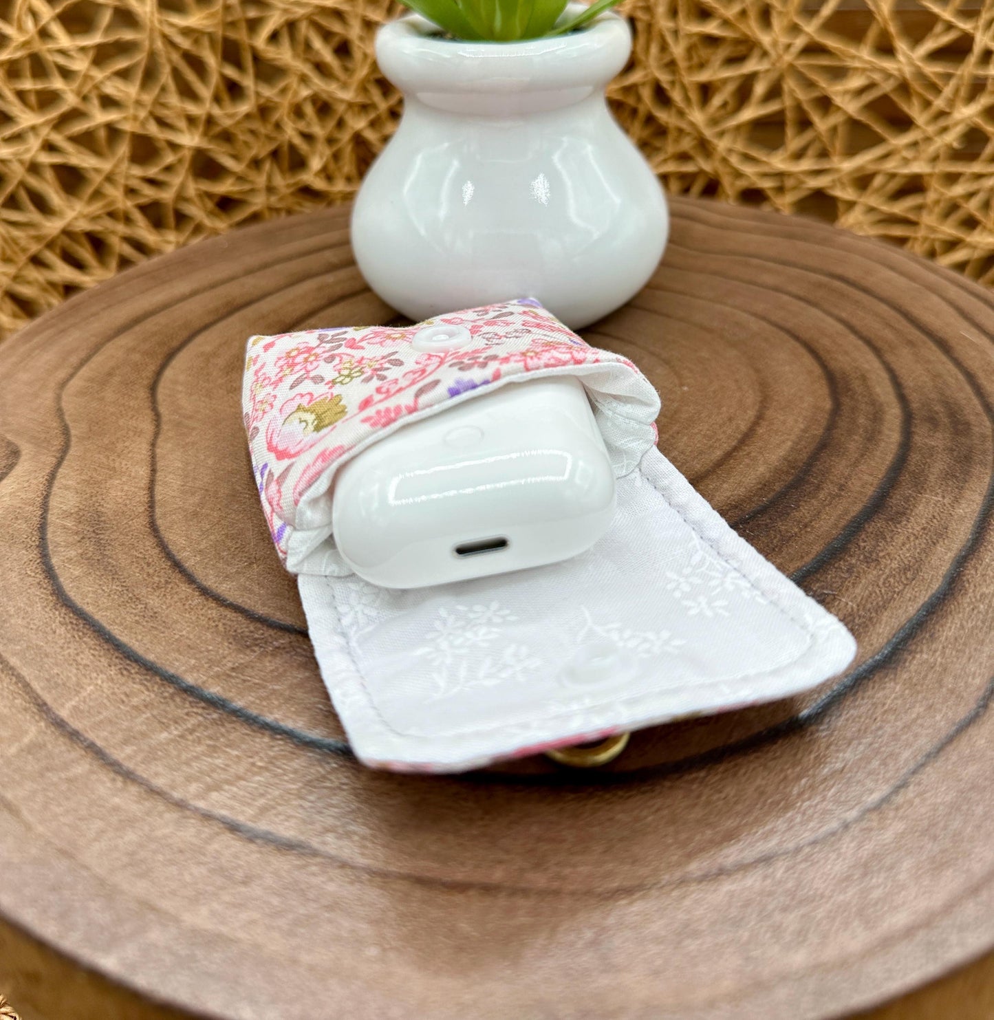 Wireless earbud case, Dainty Lilac and Pink floral fabric with snap closure and swivel clasp for added protection and convenience, 3X3X.75"