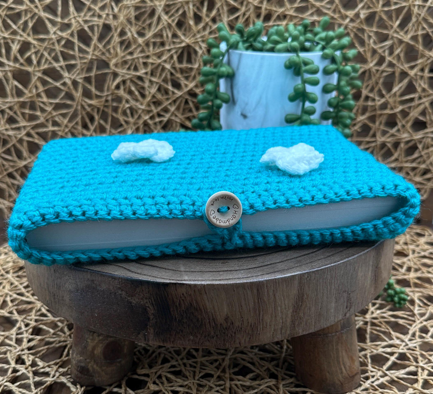 Flower Power Book Sleeve, Soft Crochet in Teal Blue Yarn with White Flowers, Secure Wood Button Closure Measures about 9X6"