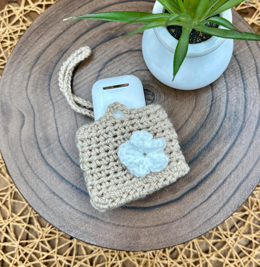 Beige Crocheted Wireless earbud case, compatible with AirPods, measures 3.25 W 2.75 H .5 D